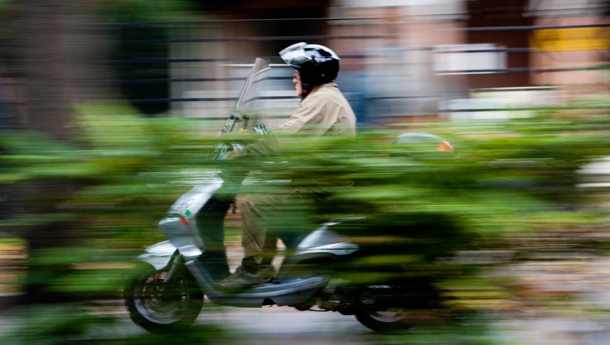 The man on a scooter