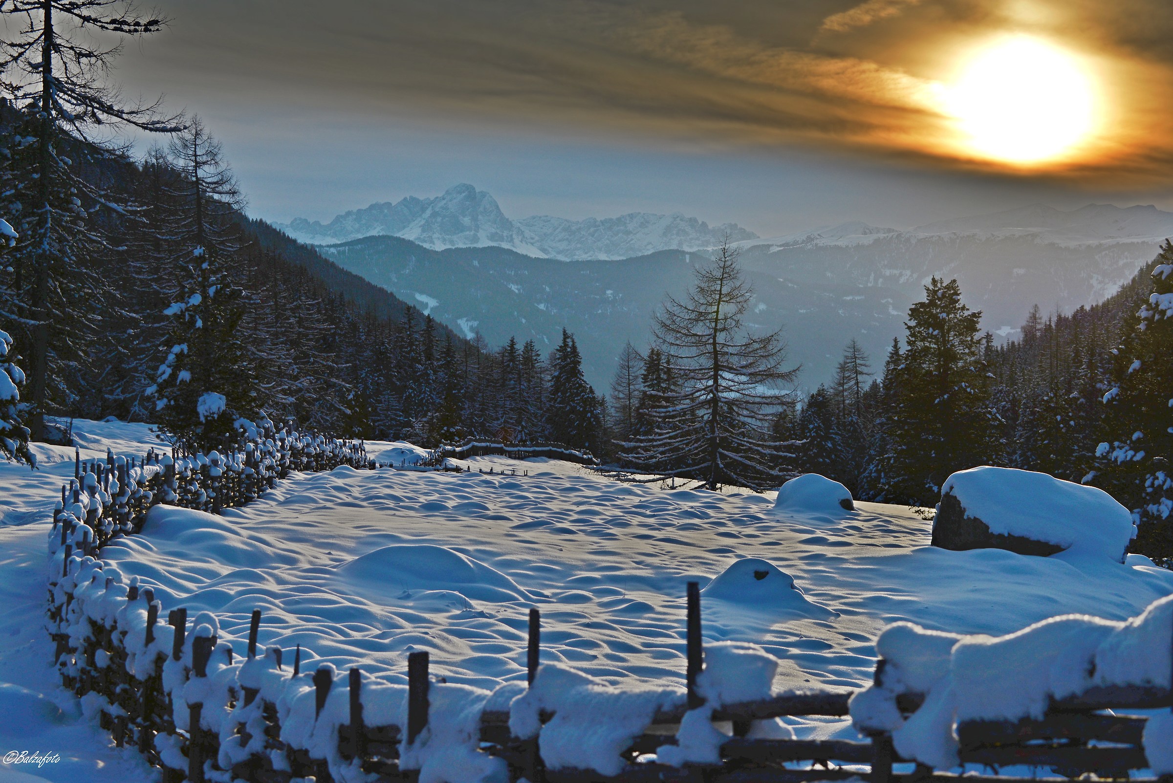 Winter landscape at sunset