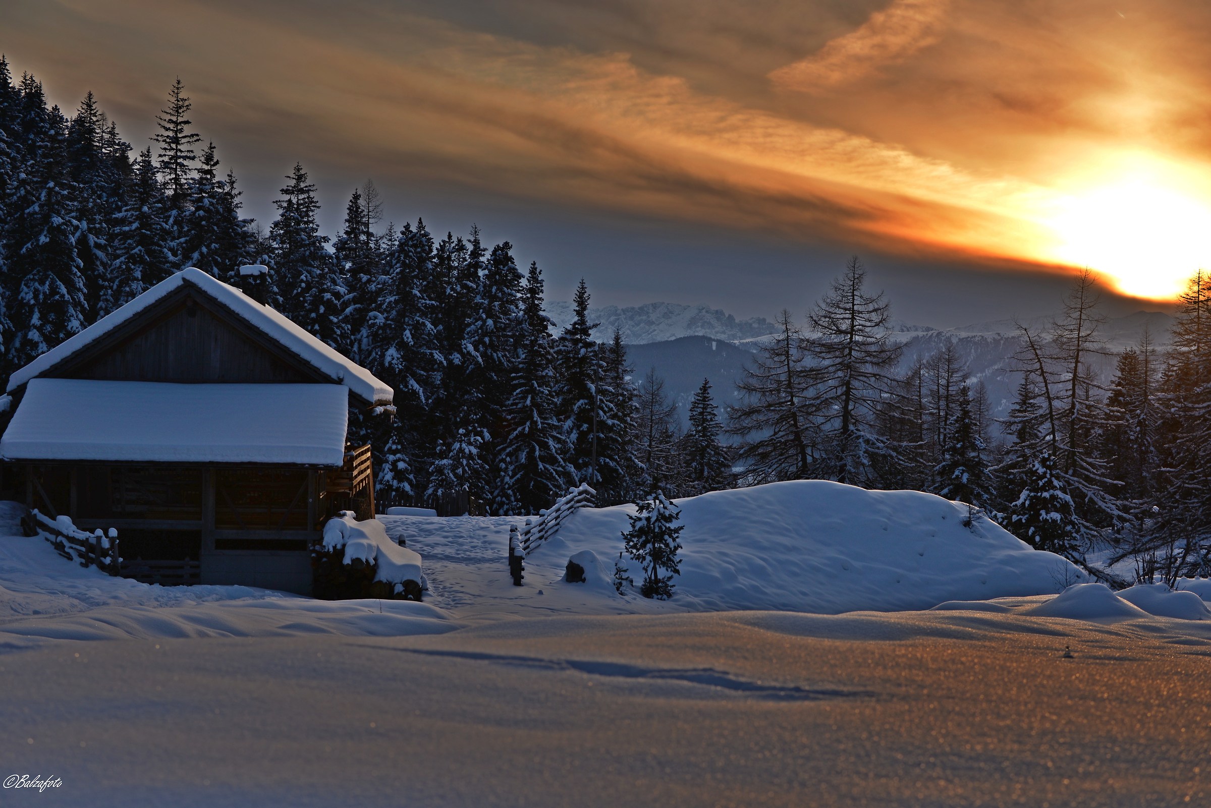 Winter landscape at sunset