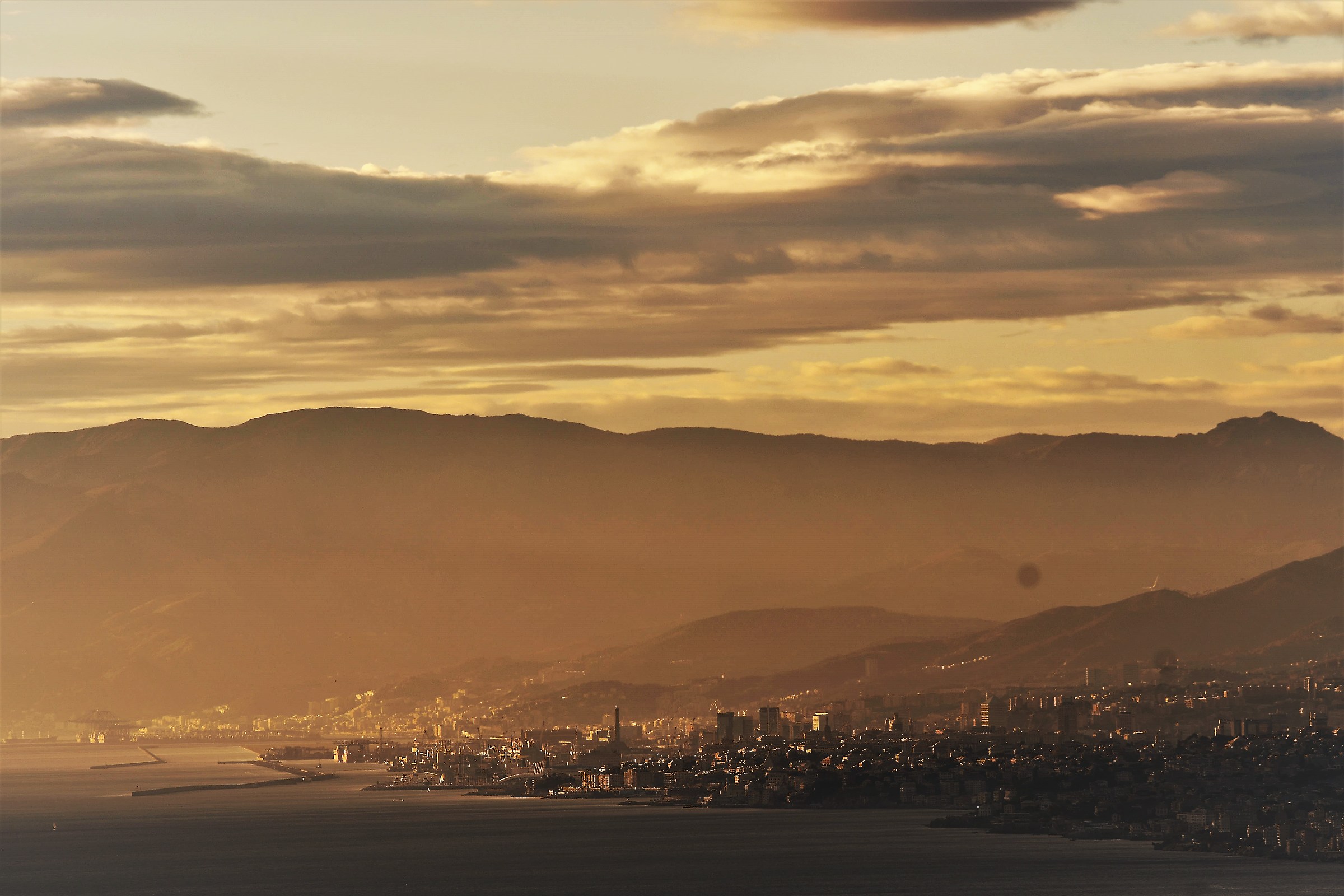 Genoa in the distance from S.Rocco di Camogli