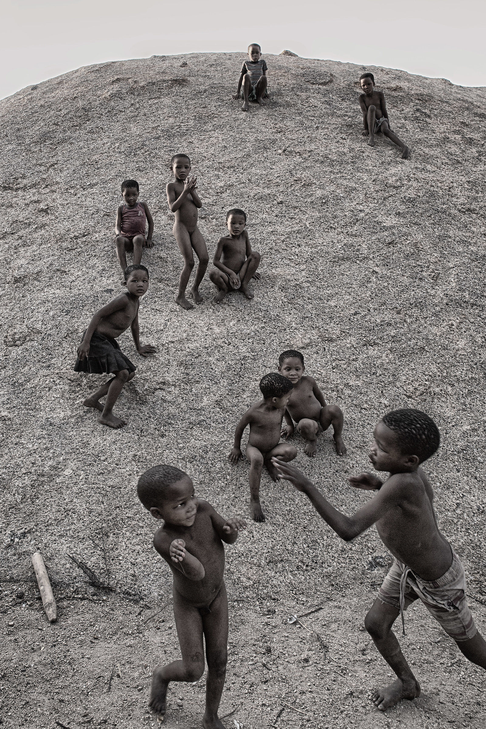 Kids playing near in San village. Namibia, 2017.