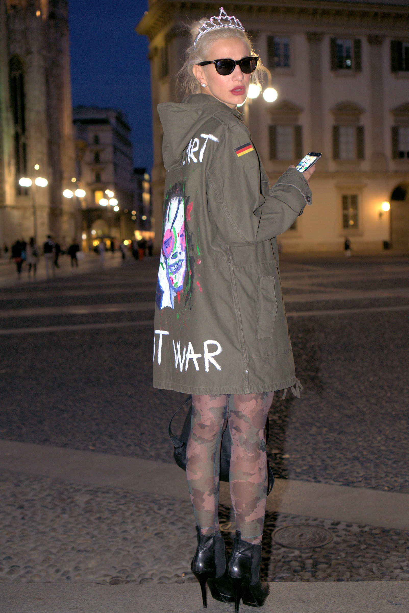 Princess with sunglasses in the evening