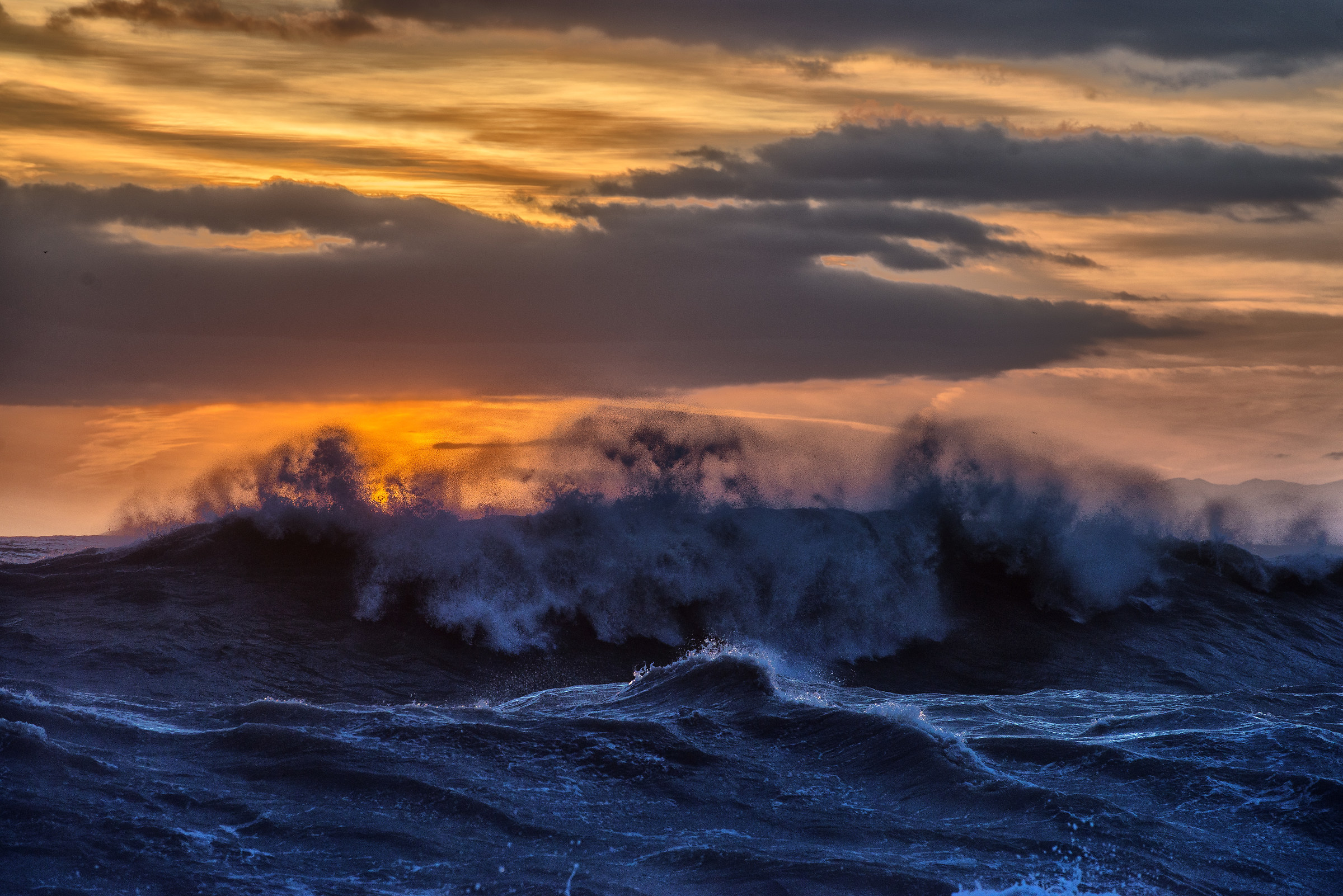 waves at sunset