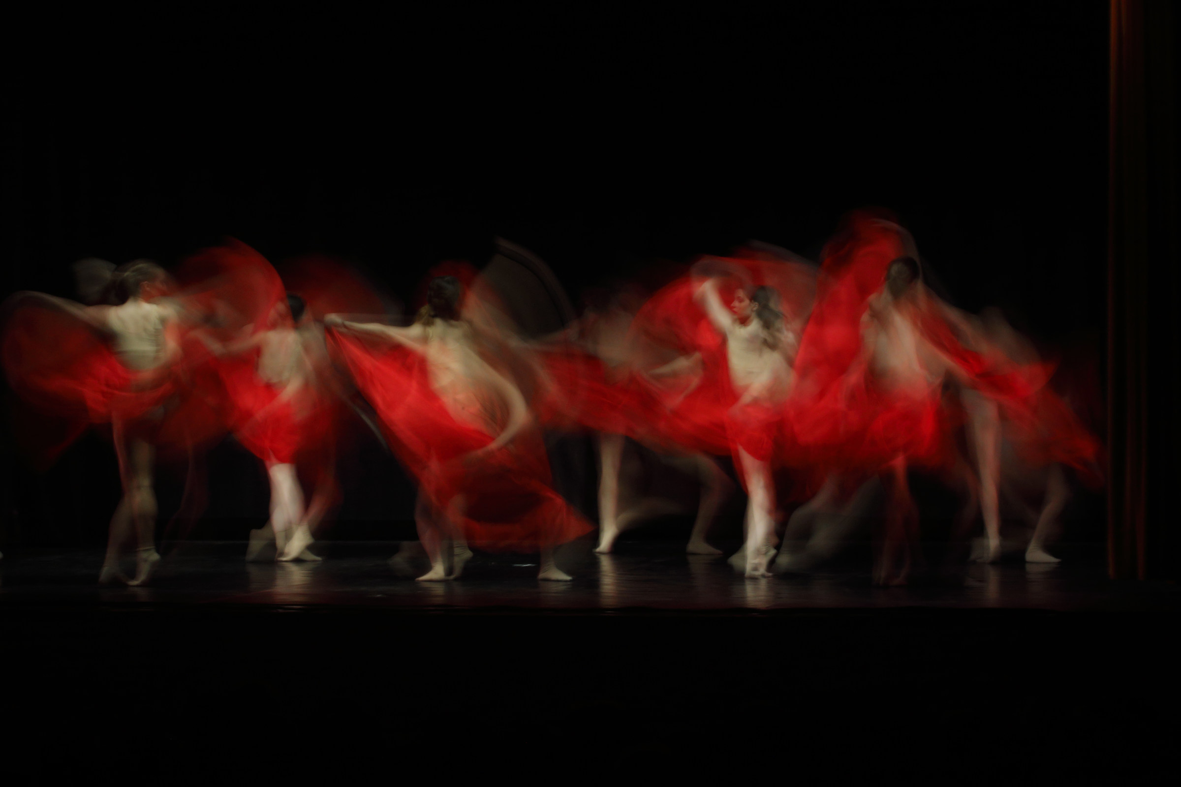 The dancers in red