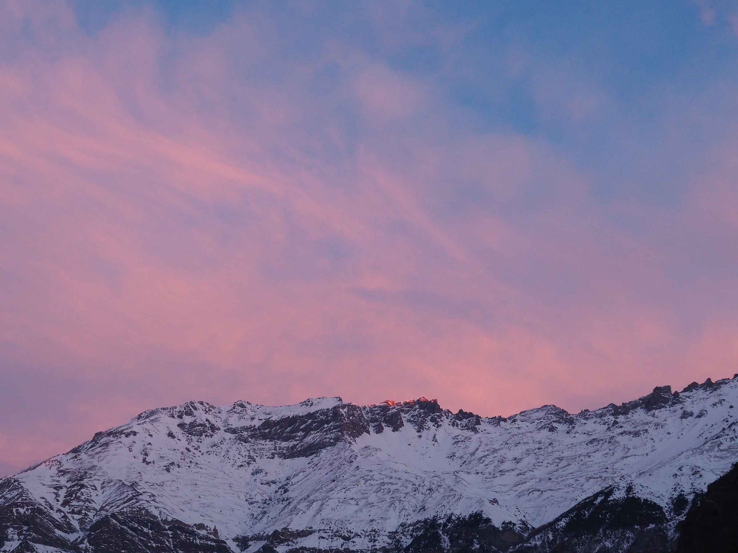 The touch of the first rays of the sun.