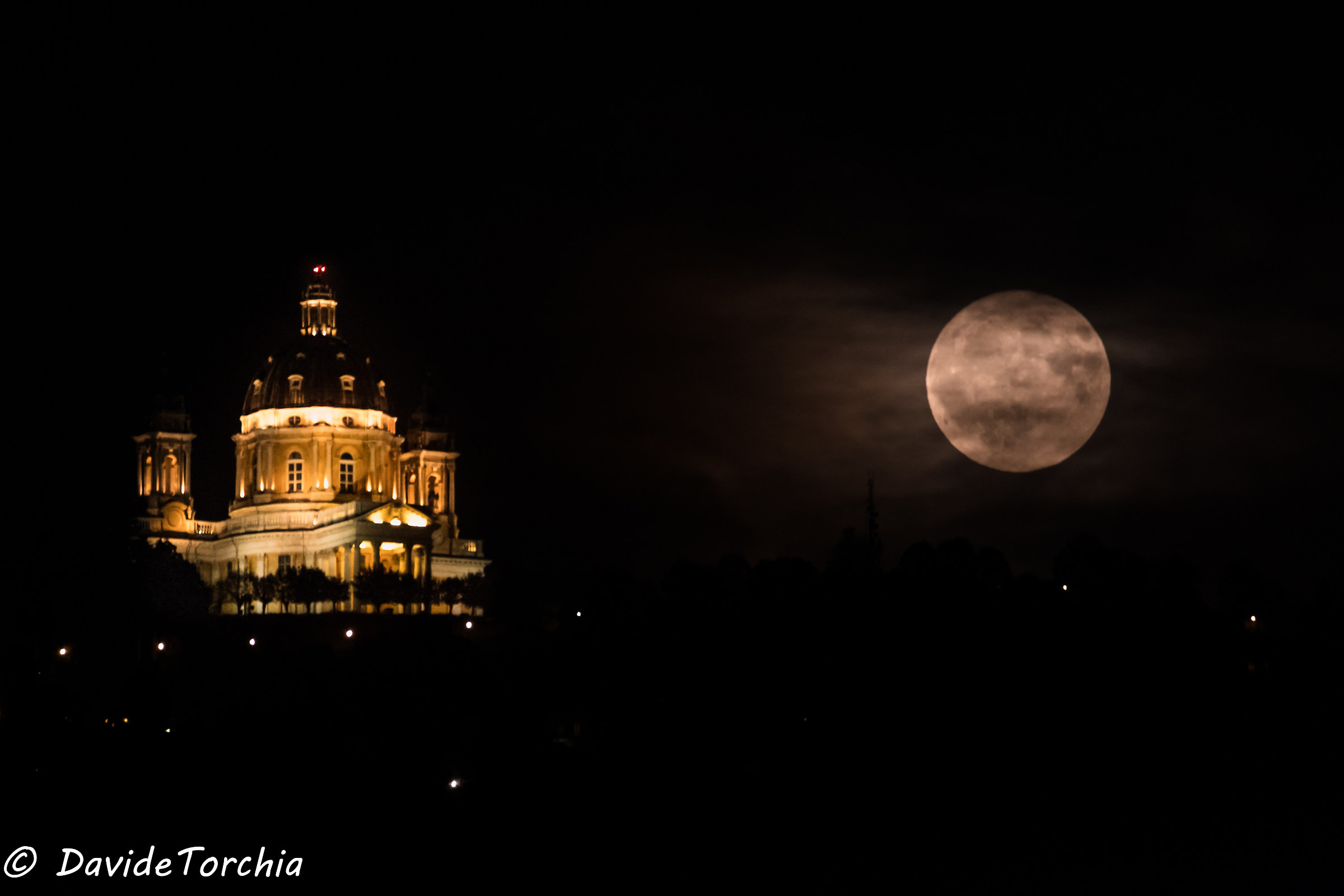 The moon rises and the curtain of a new world falls