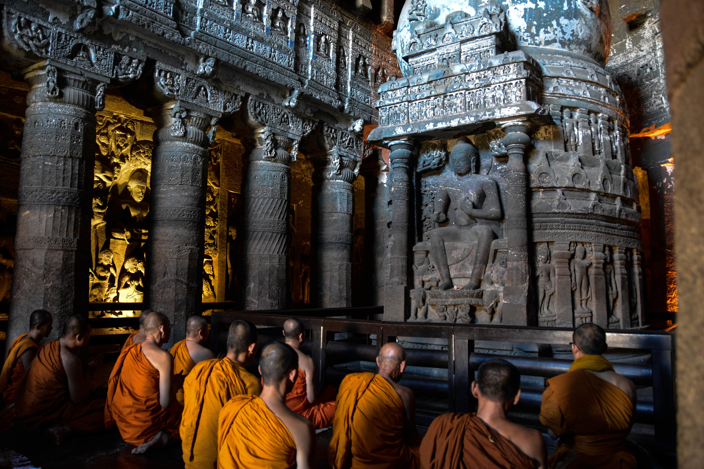 India - Prayer monks at the Ajanta quarries