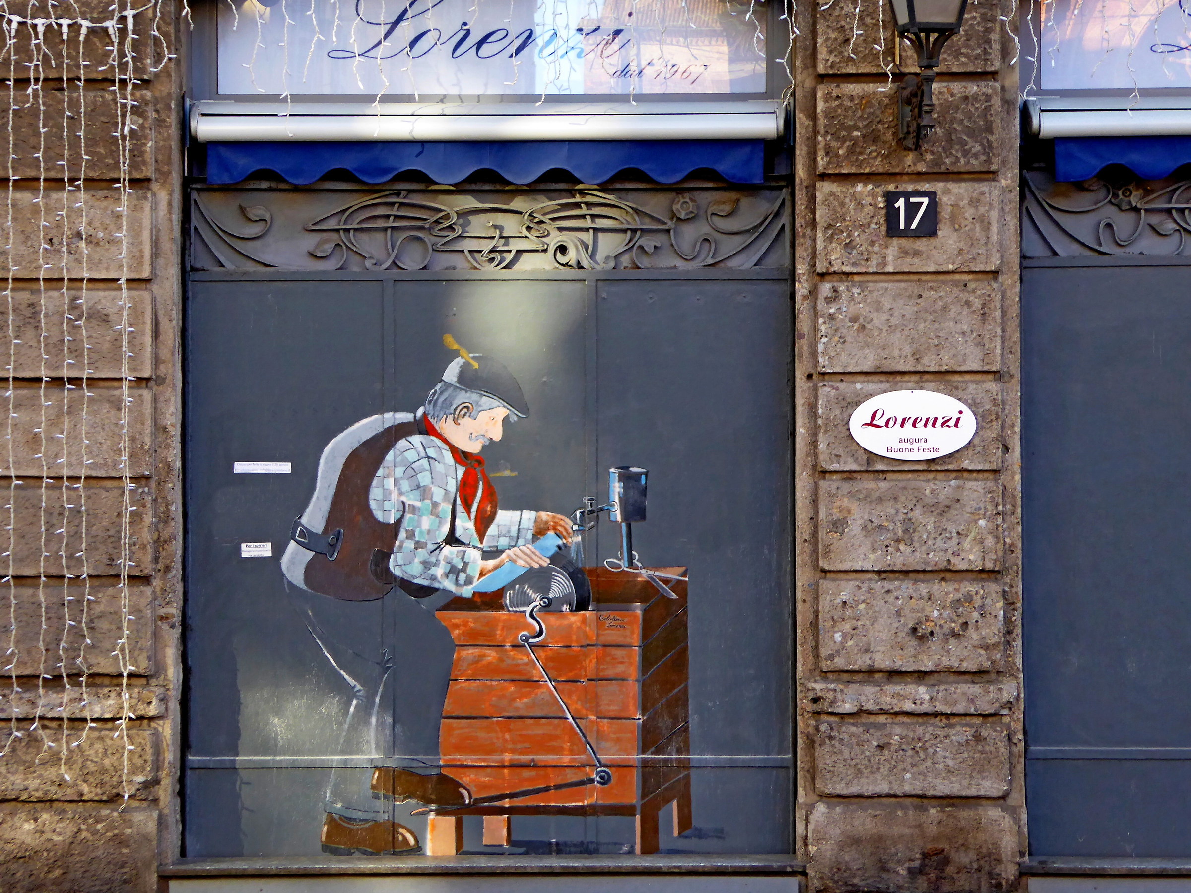 the knife grinder of via Ponte Vetero in Milan