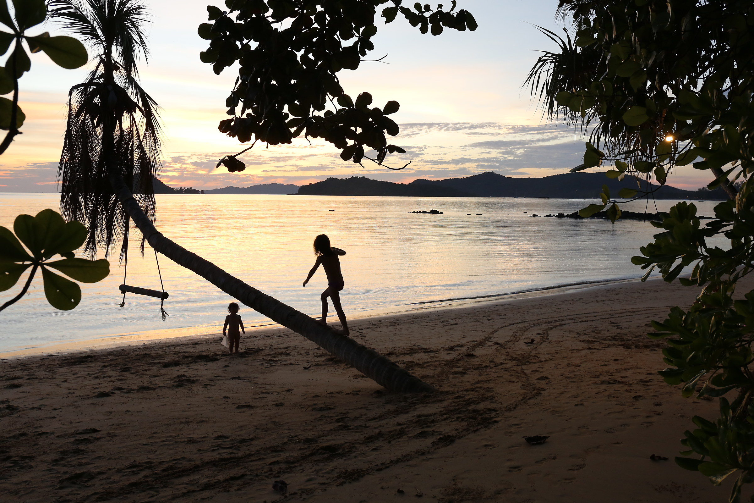 my daughters play at sunset in koh mak