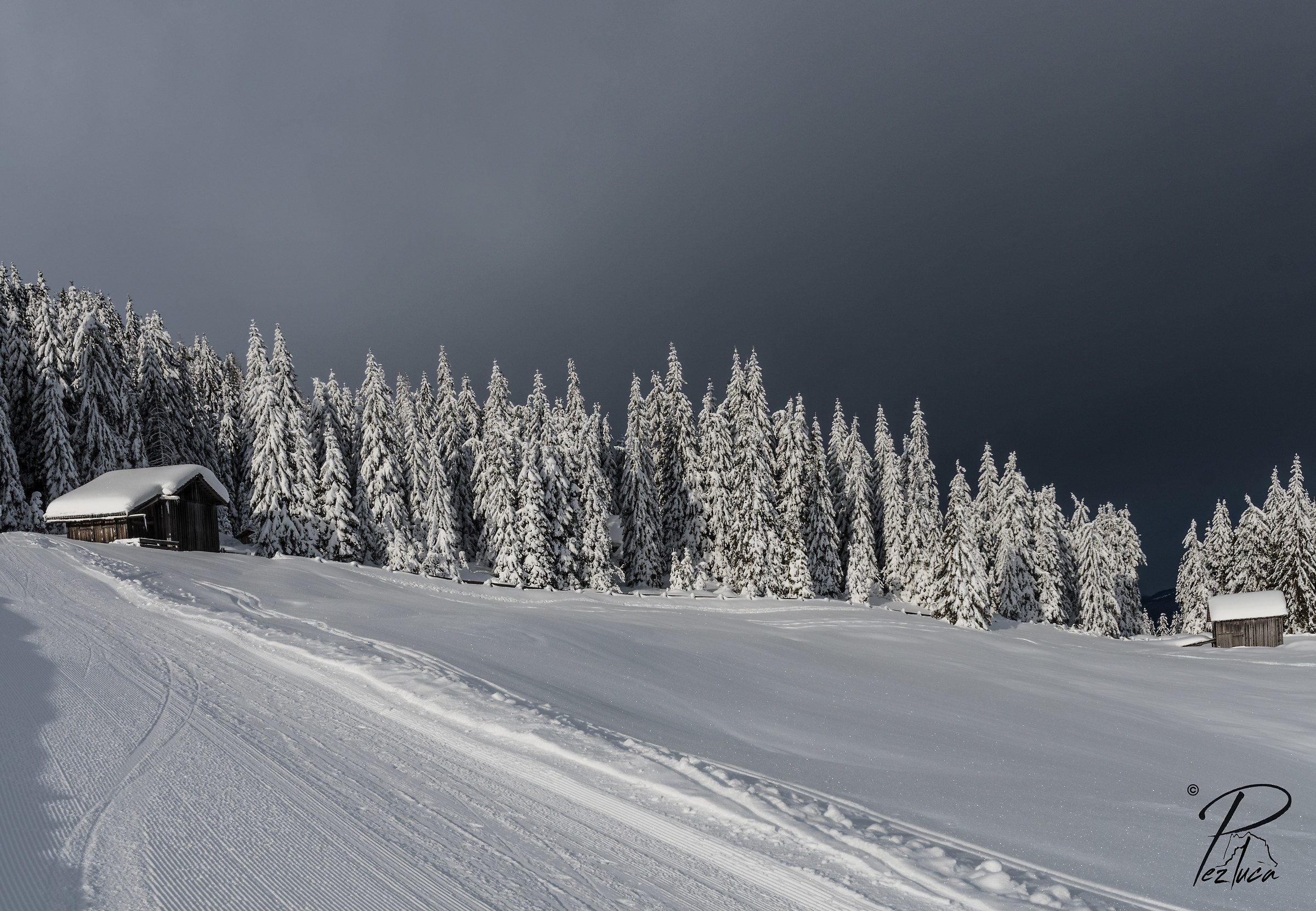 And behind, the darkness