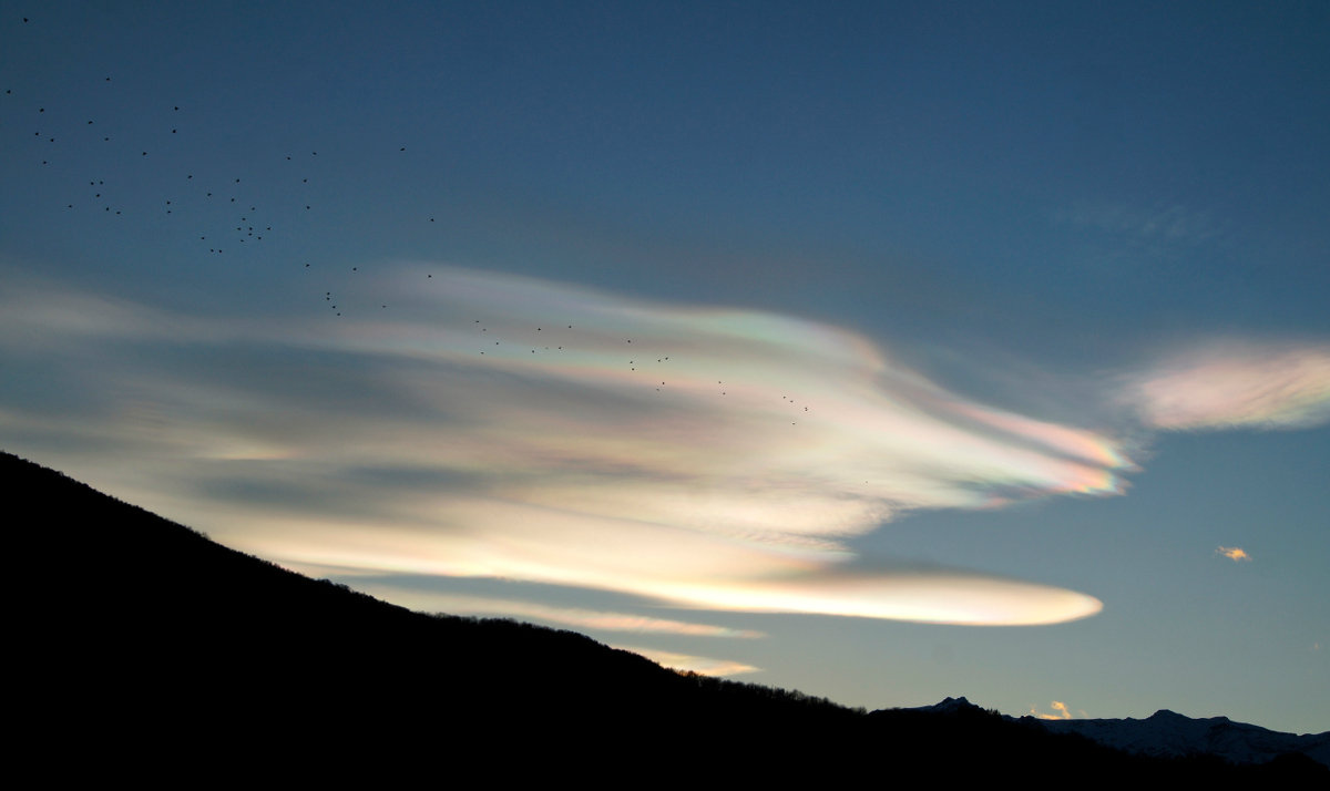 Rare phenomenon of "Rainbow Clouds"
