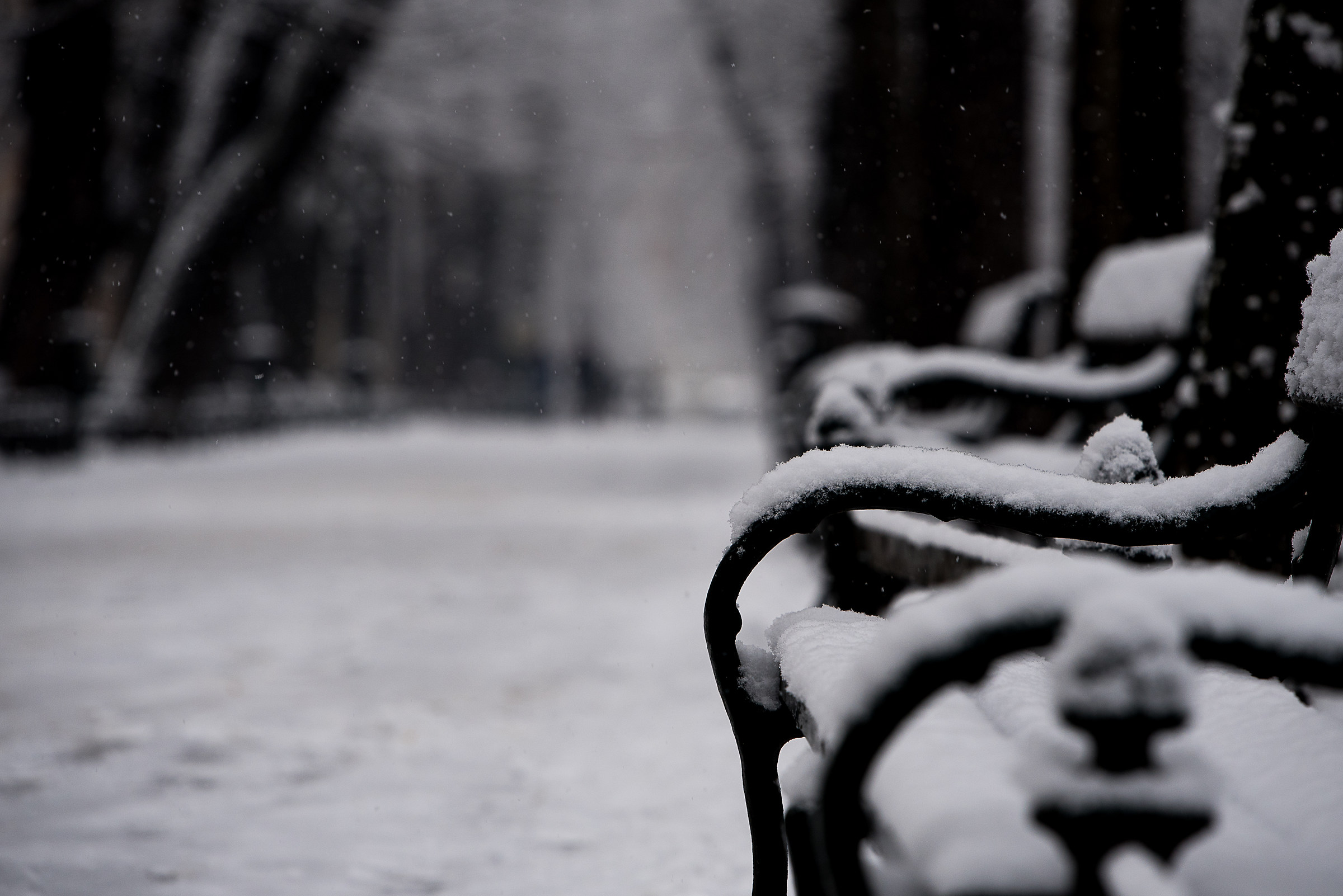 a bench in the snow