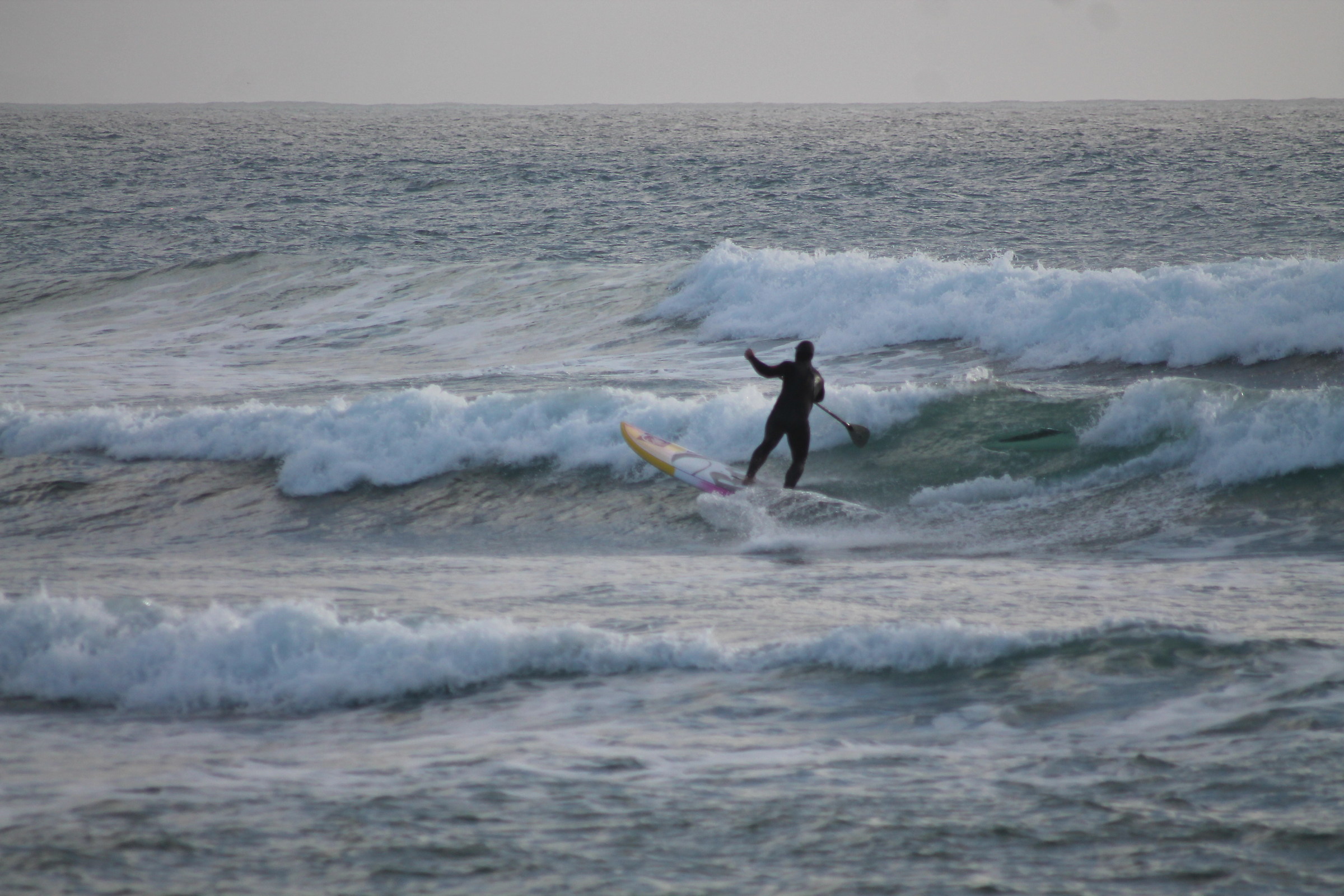 Sup ..... And strange shadow behind the surfer?