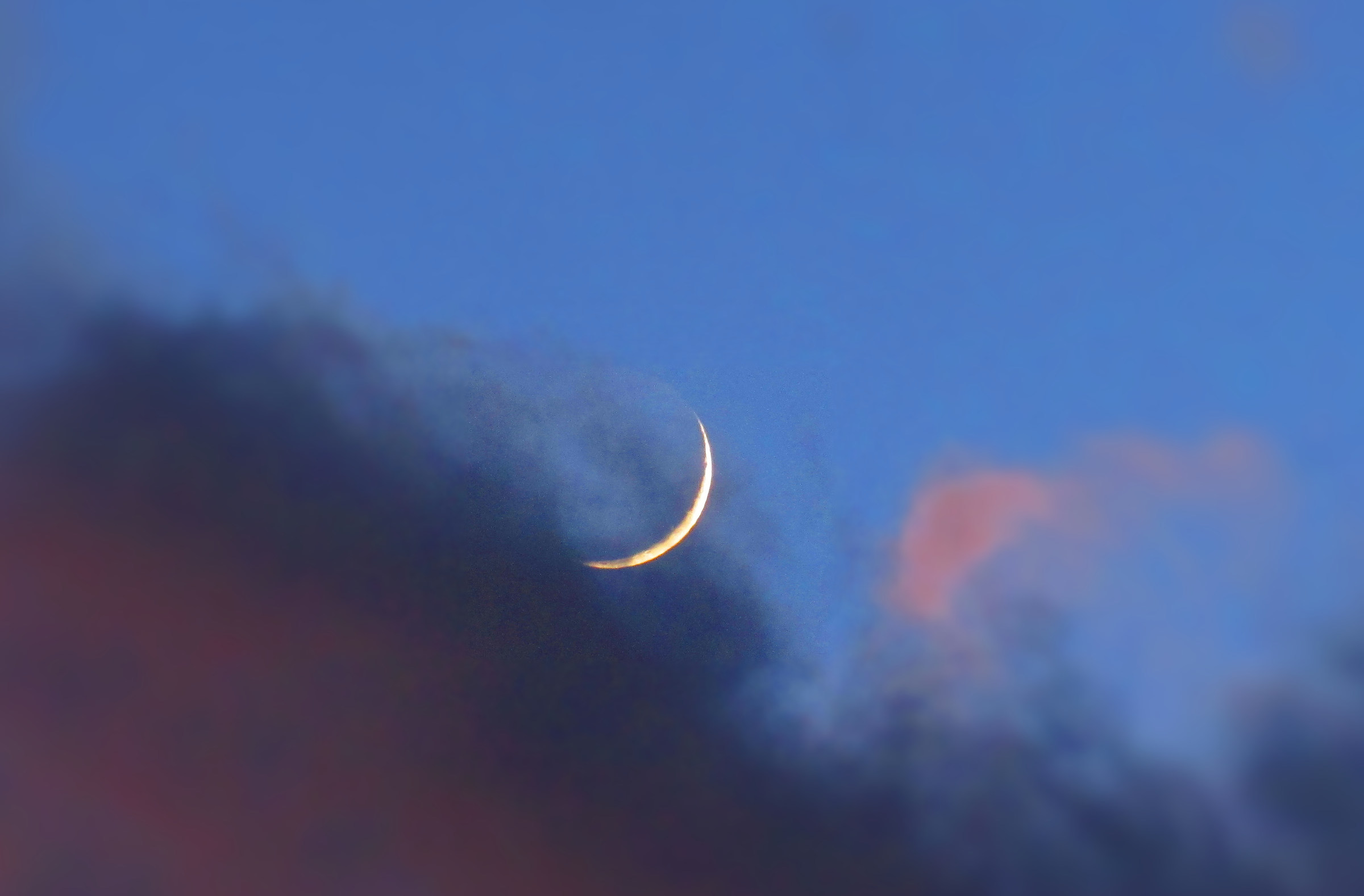 crescent moon at sunset