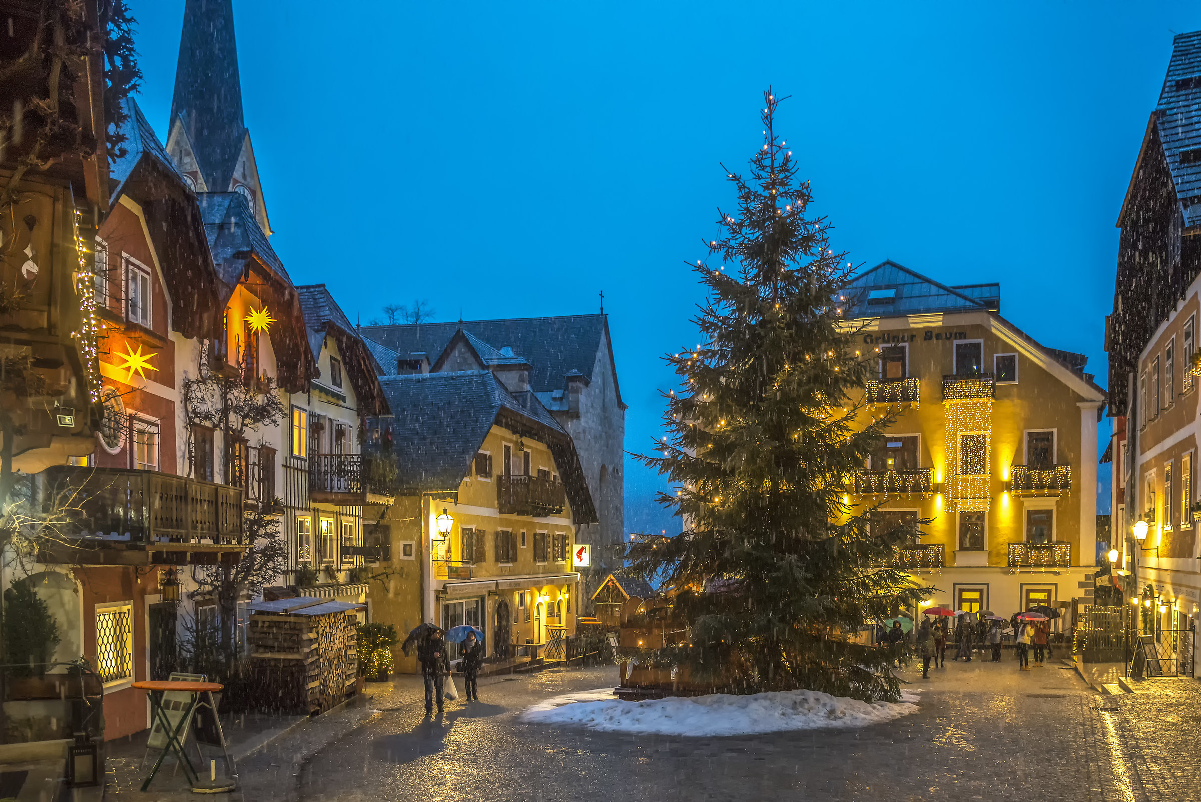 Snow on the square of Hallstat at the blue hour