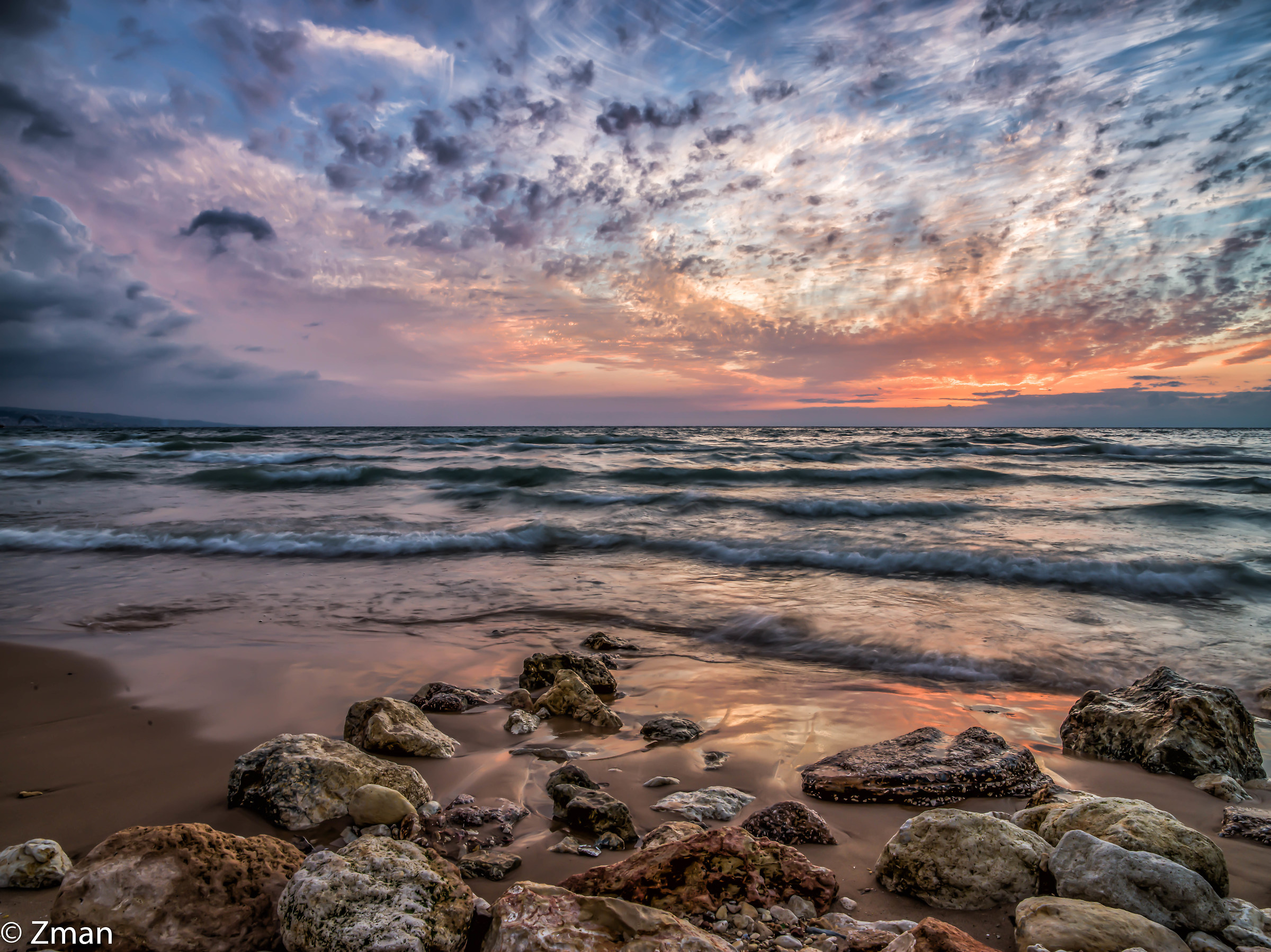 Tramonto, mare e rocce