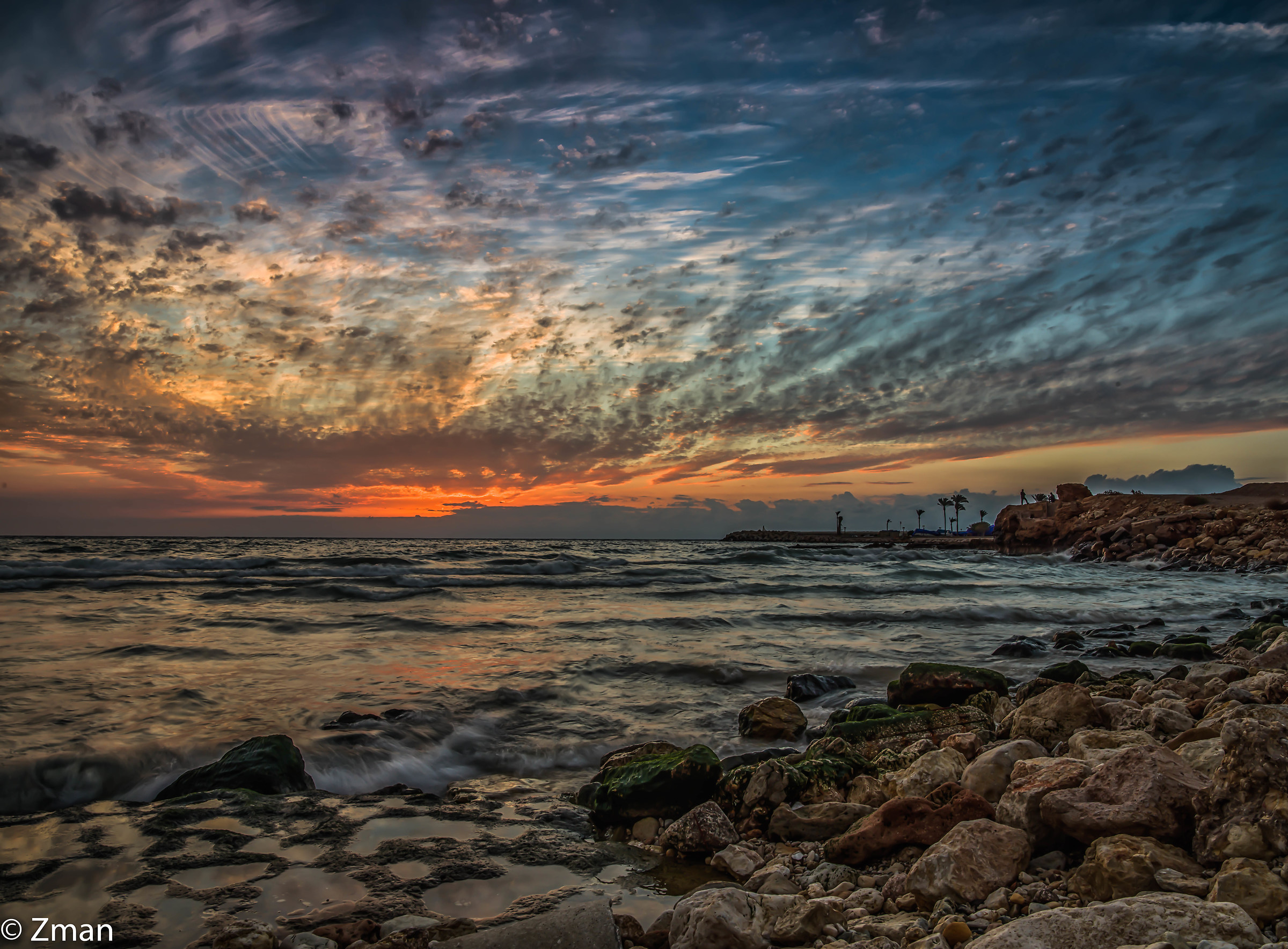 Tramonto, mare e rocce