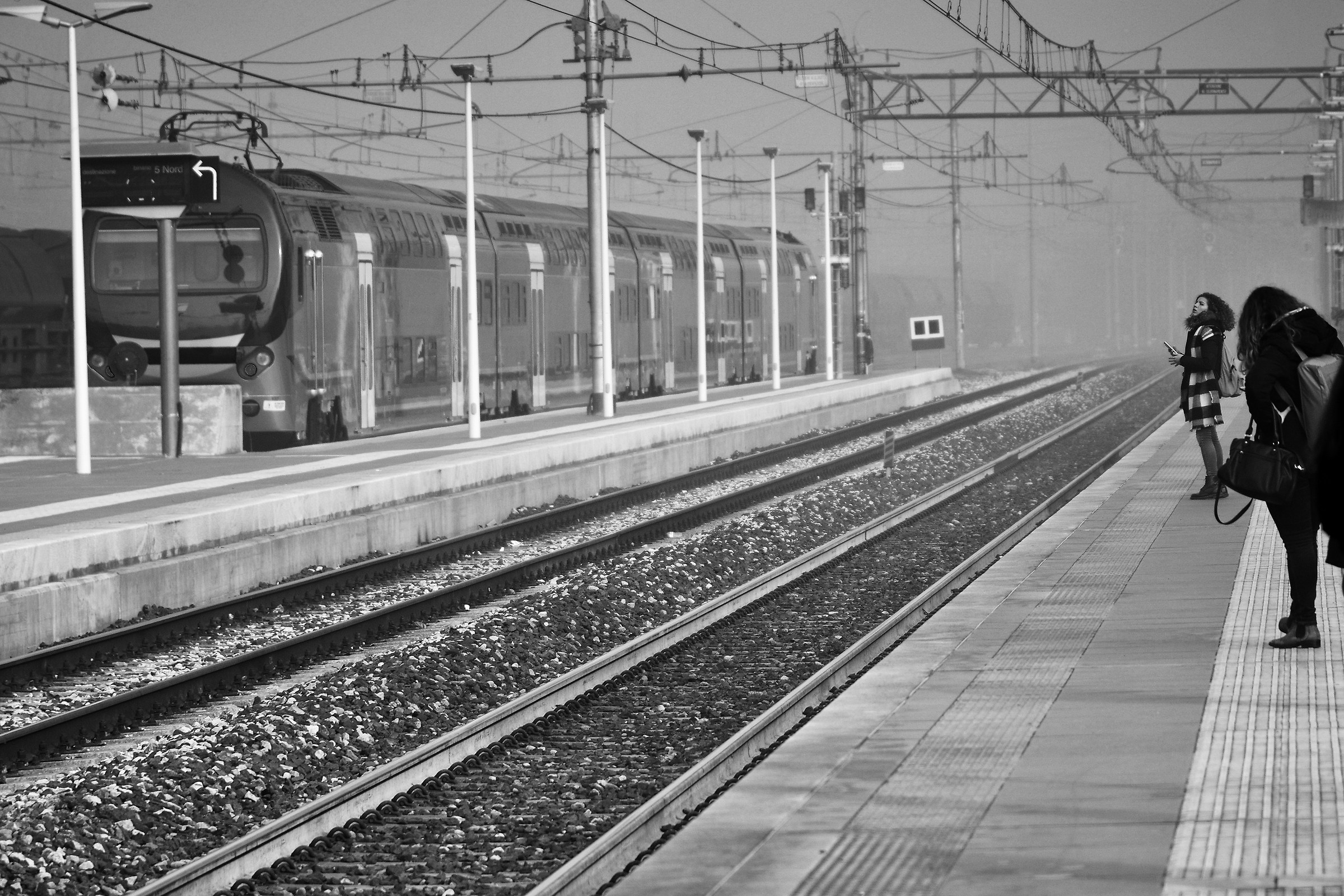 Waiting for the train in the fog