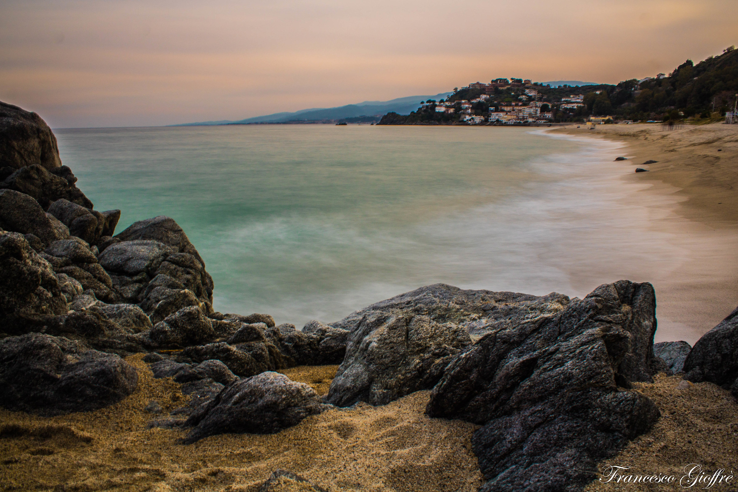 Caminia bay - sunset with rough sea