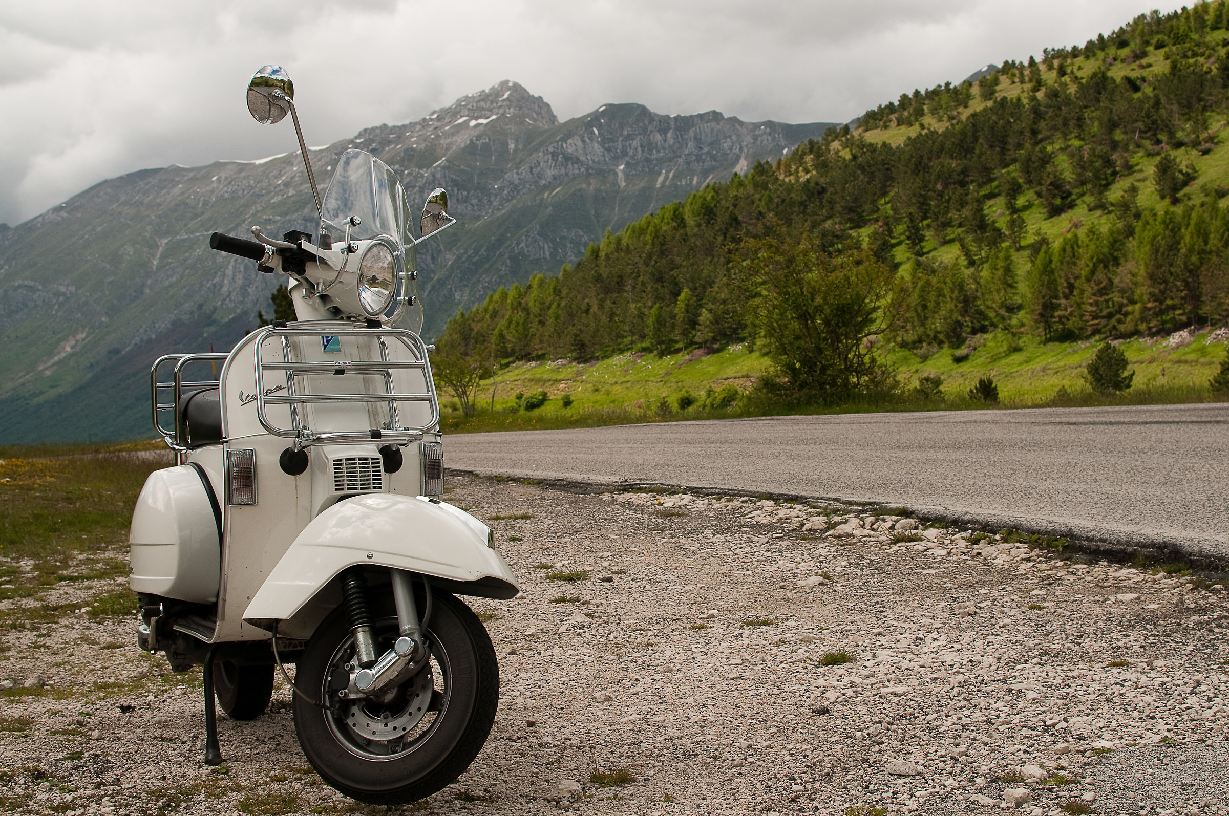 In vespa on the road