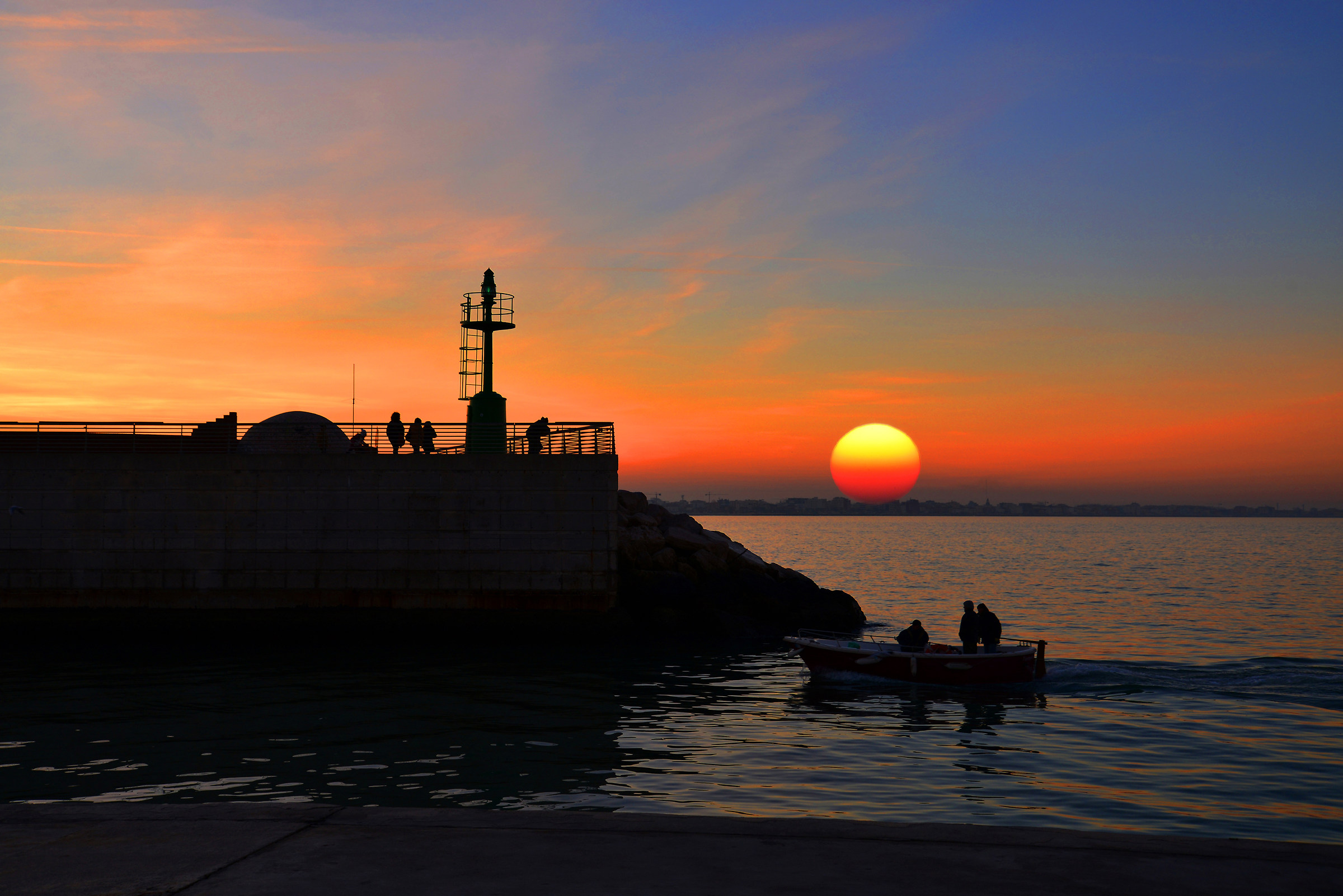Sunset on the port in Rimini