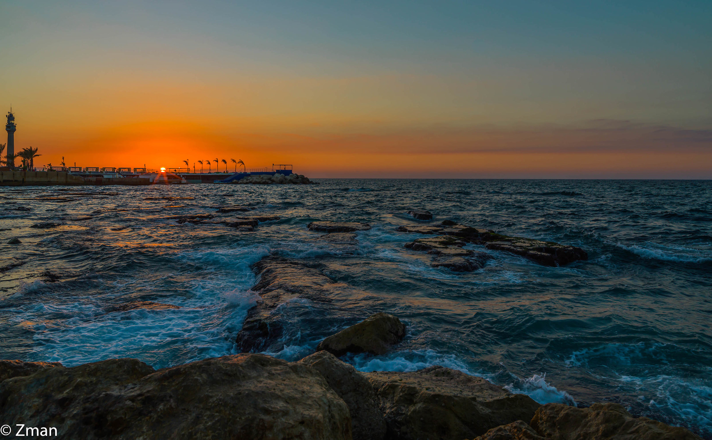 Tramonto a Almanarah Rocky Beach