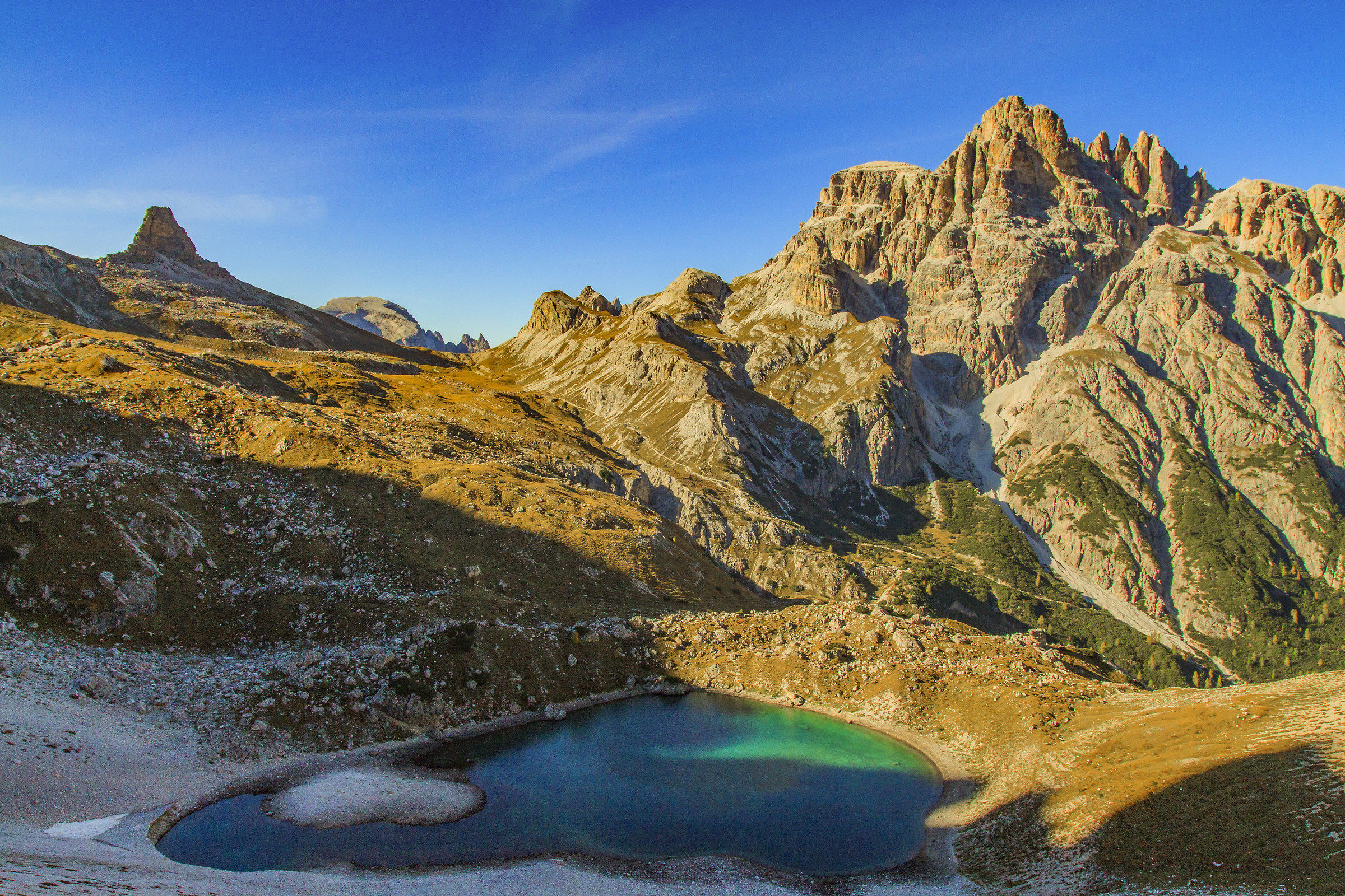 Golden light behind the Tre Cime di Lavaredo