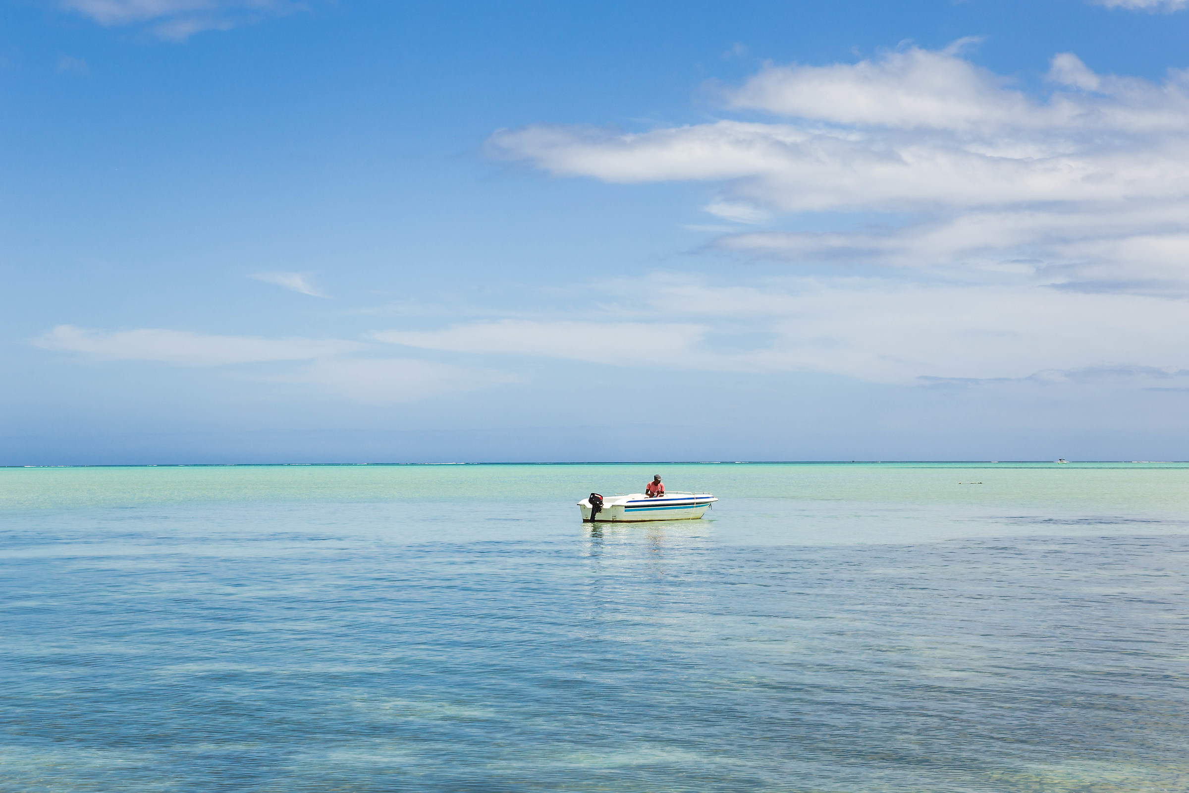 fisherman in the lagoon