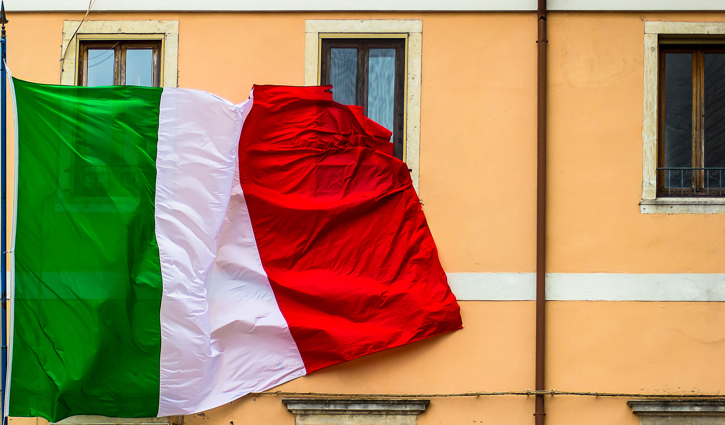 like a flag in the wind