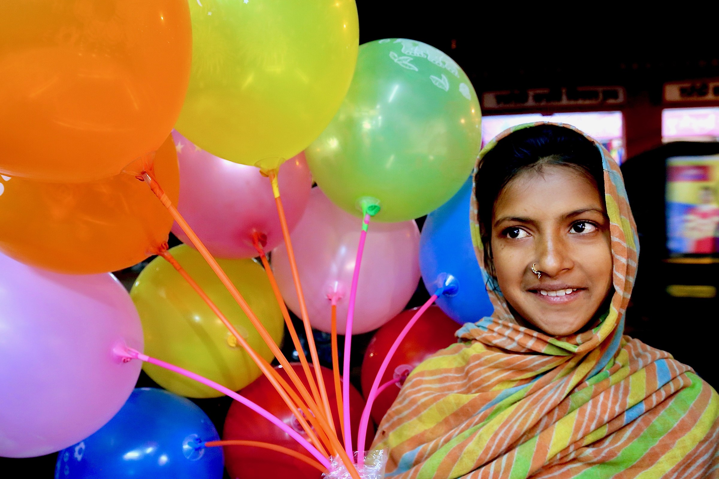 Little seller of balloons