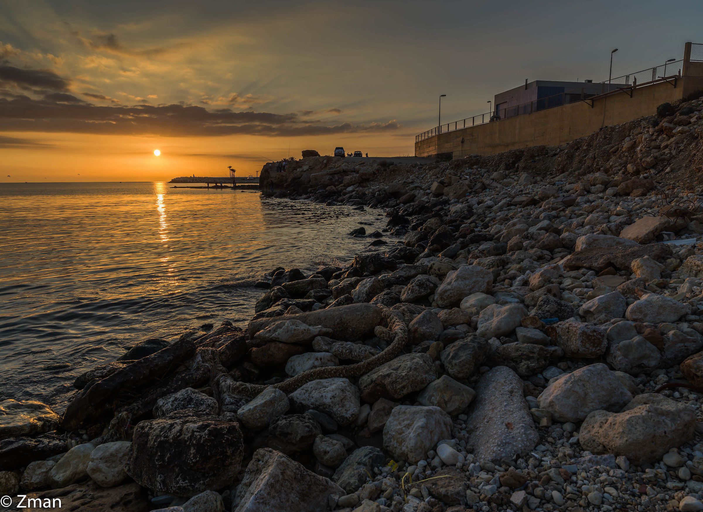 Rocce, mare e tramonto