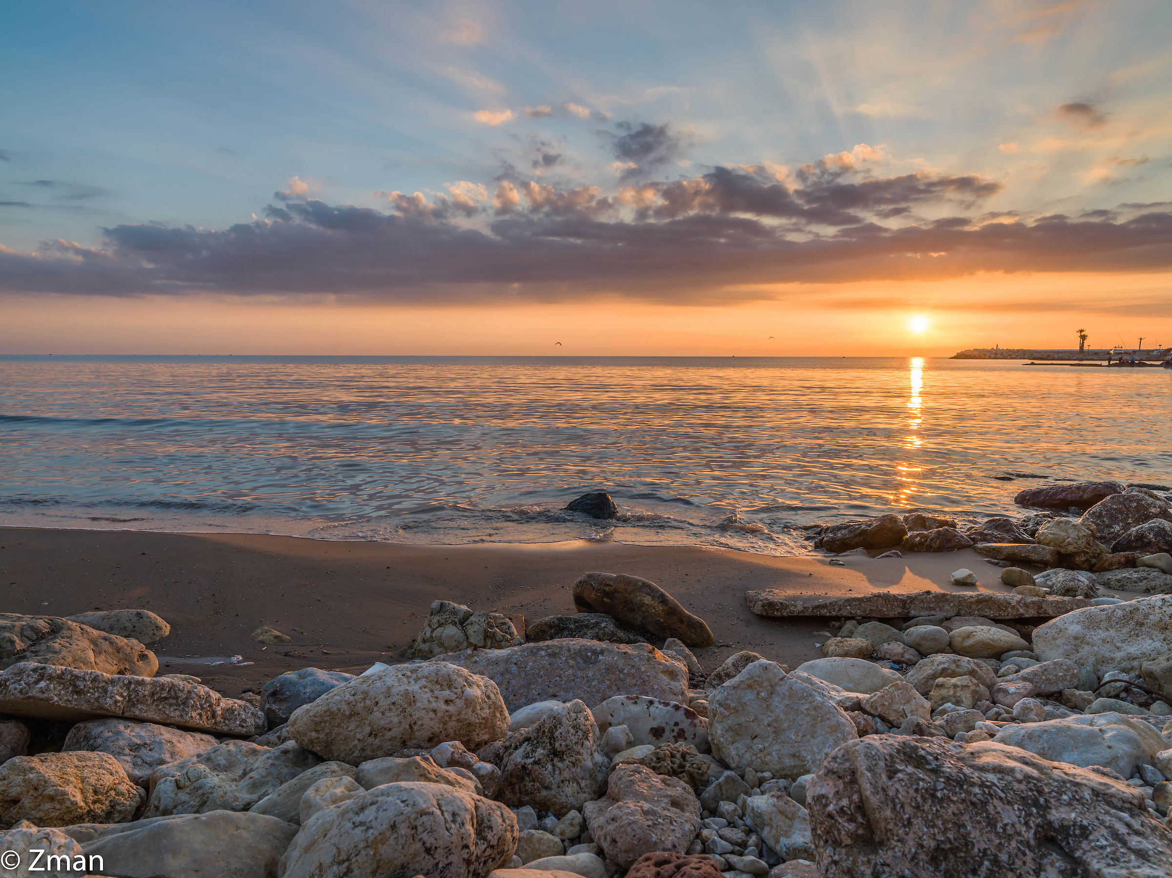 Rocce, mare e tramonto
