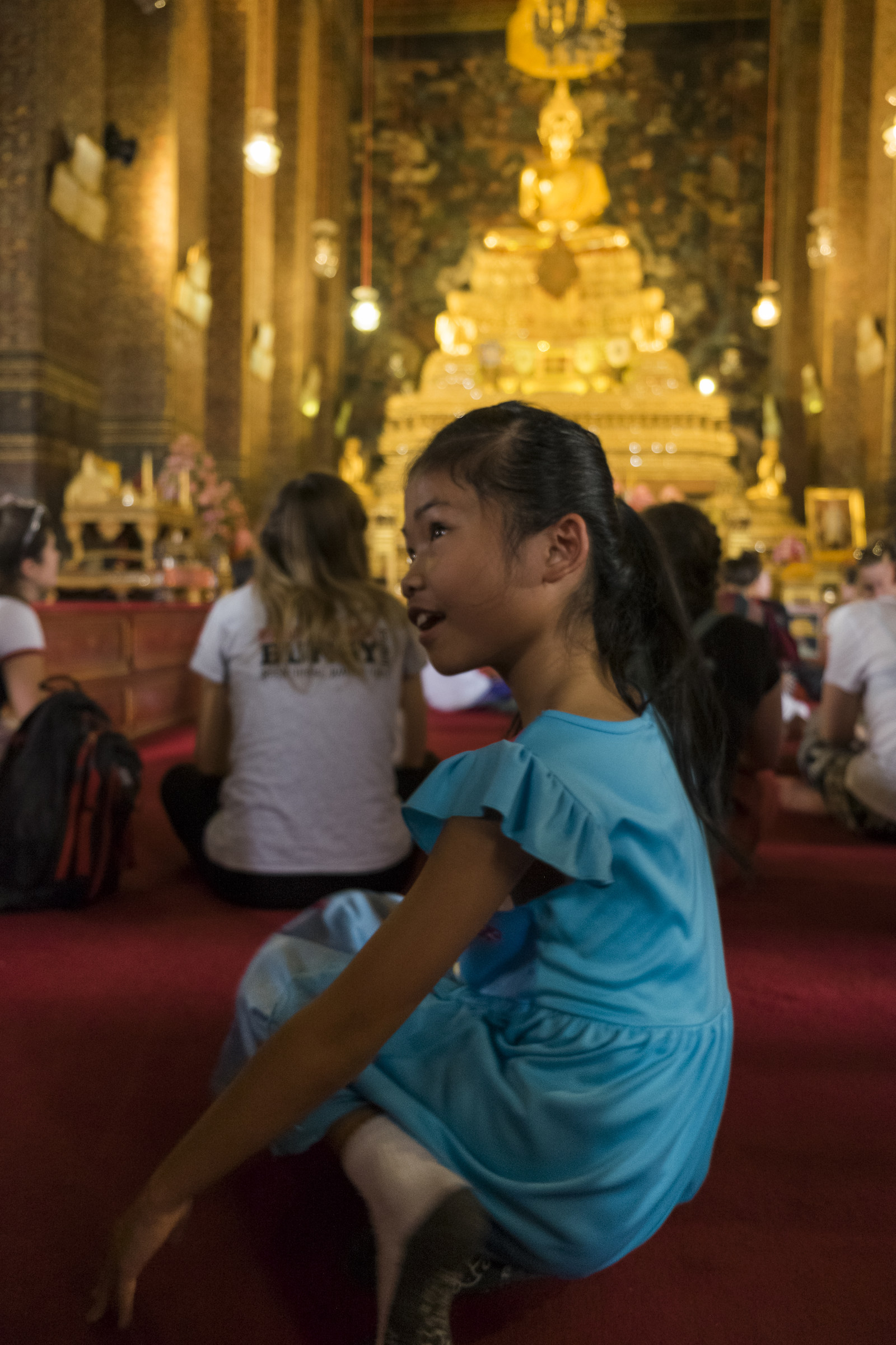 little girl in a temple in BKK