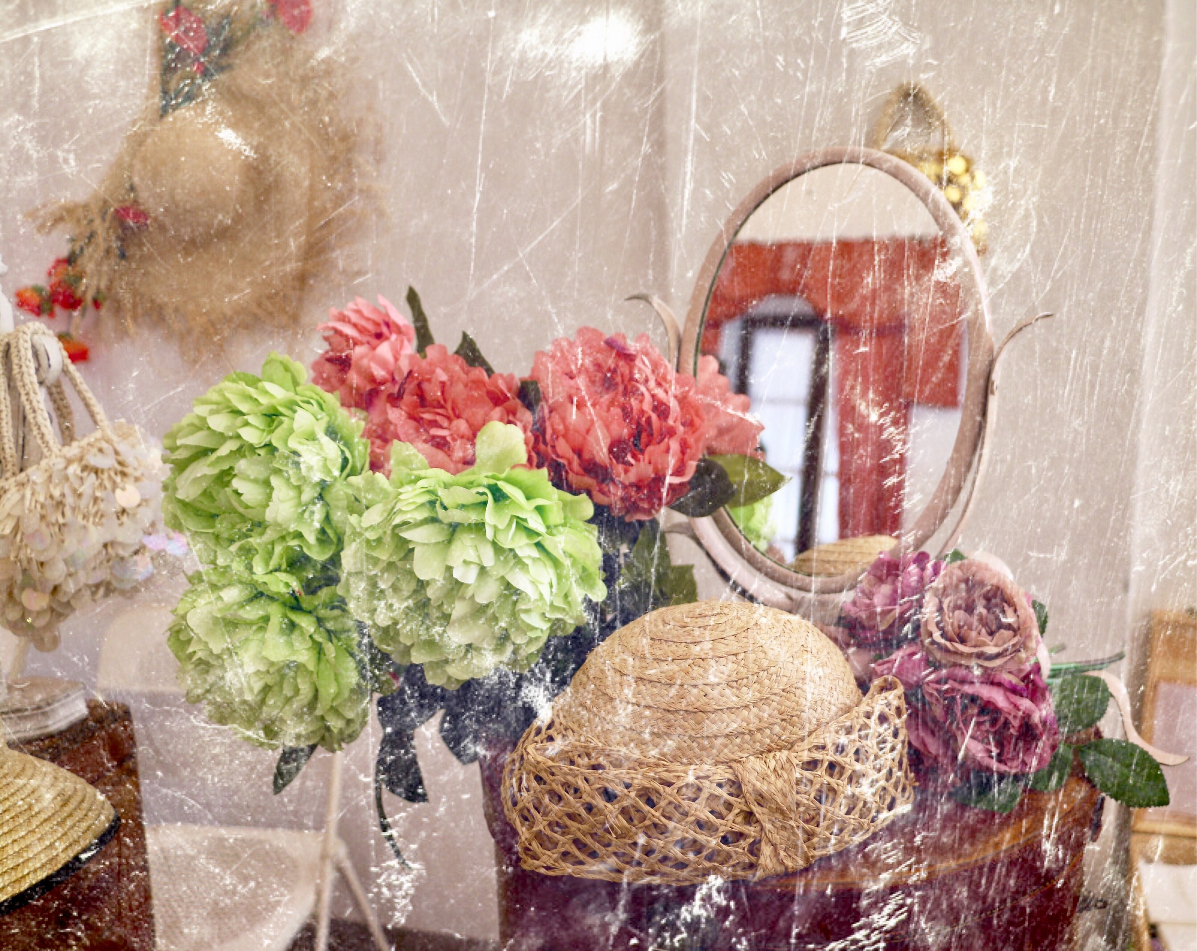 Behind the curtain of cellophane.