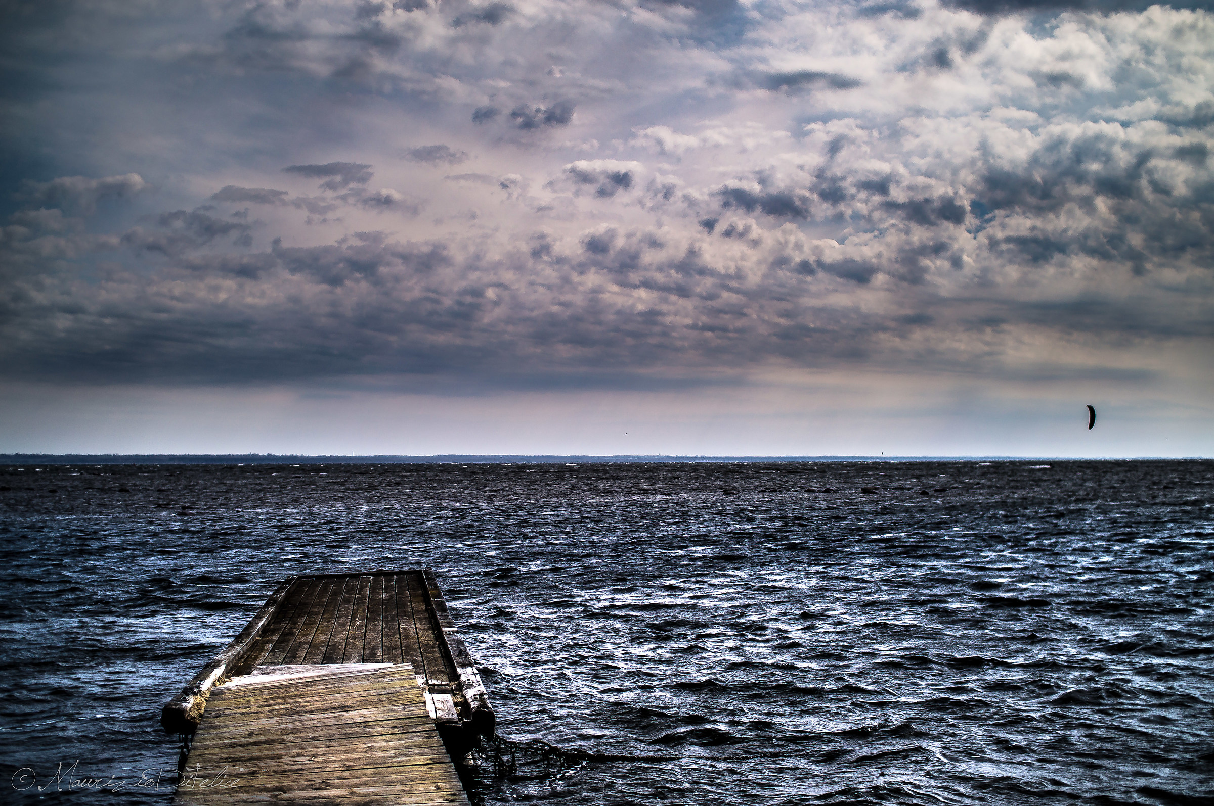 Clouds and kite on the Baltic Sea