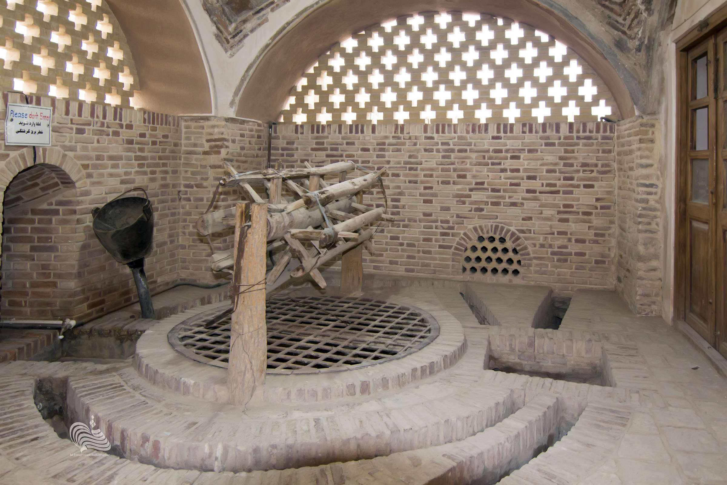 Ancient water well wheel