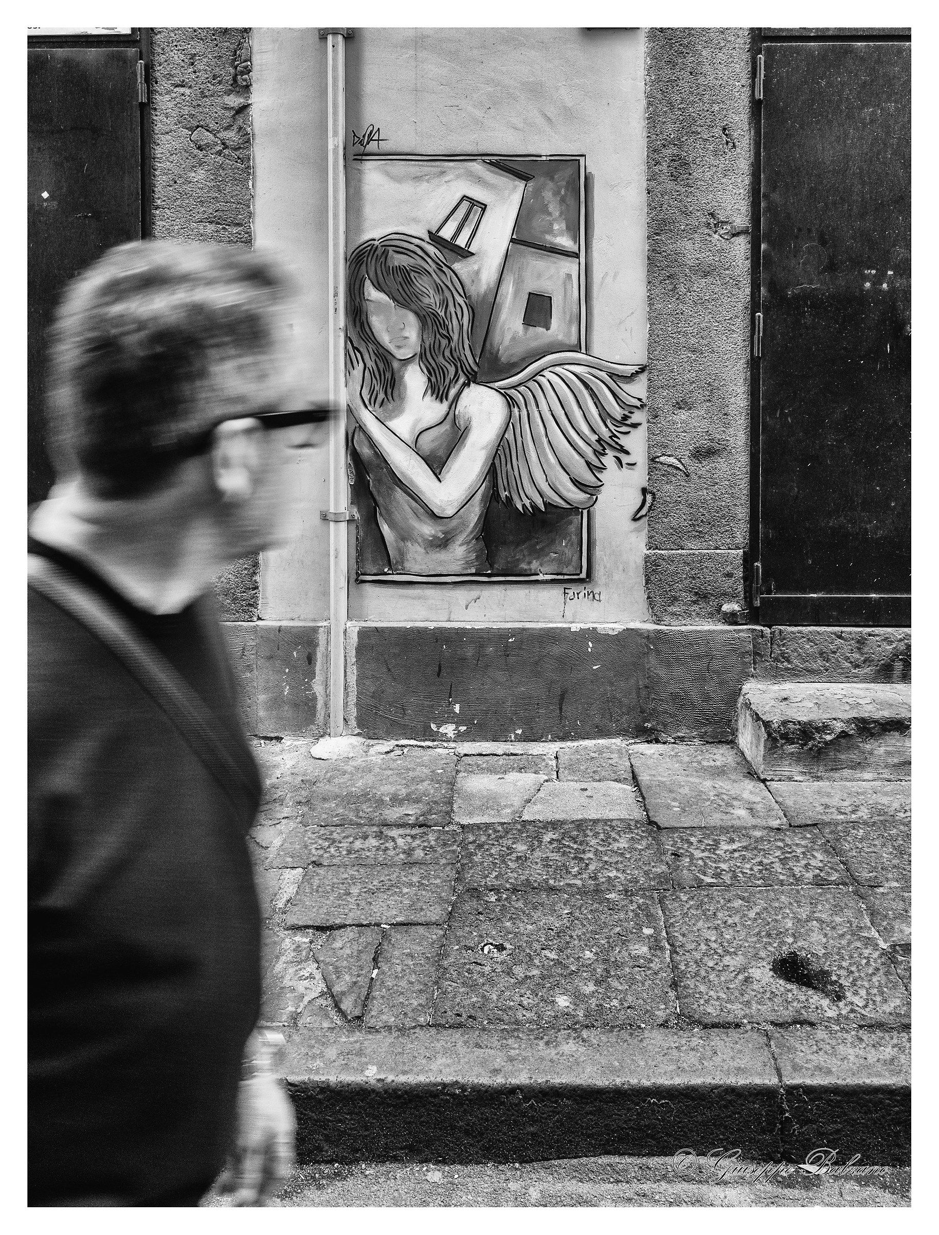 The angel looks at you.