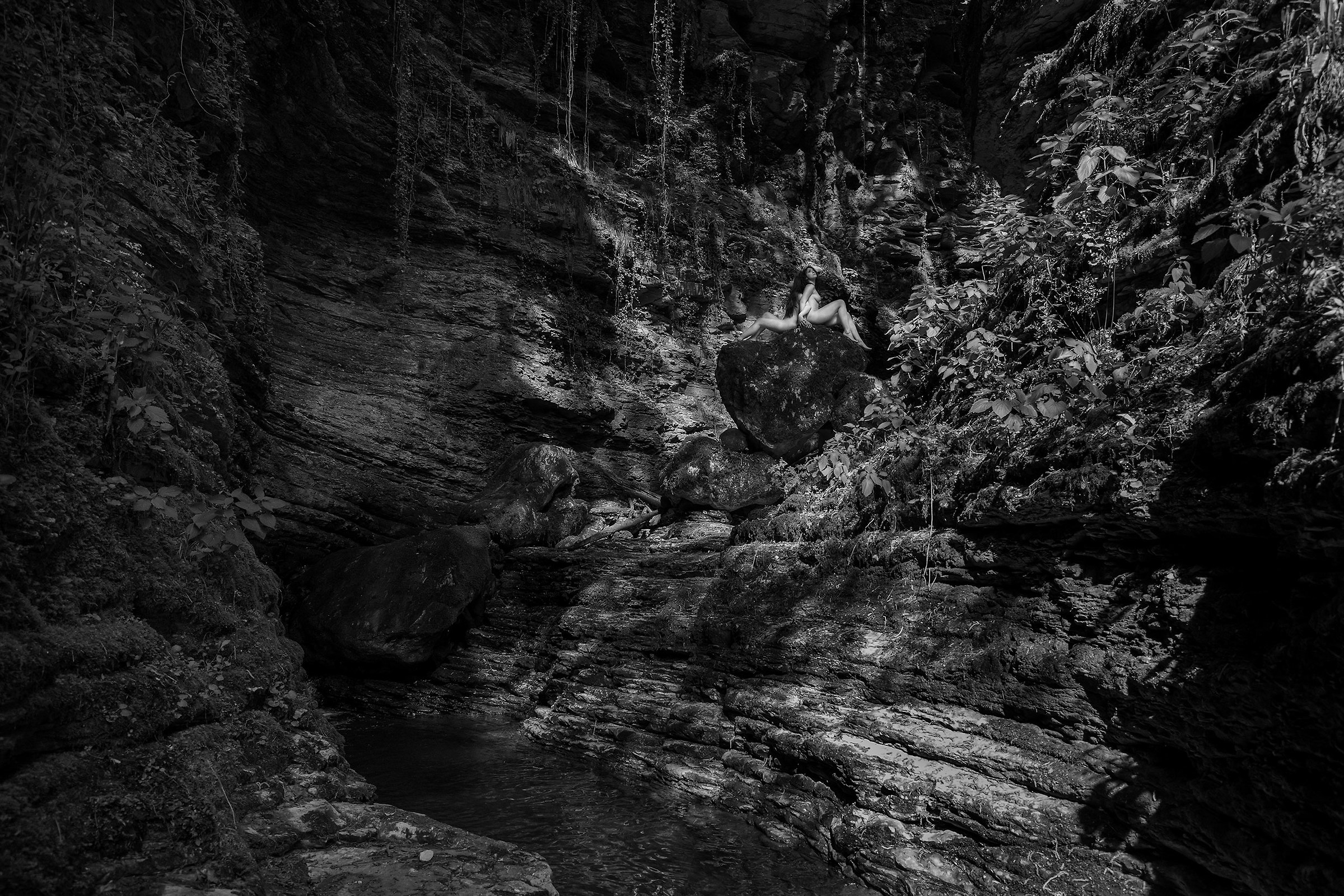 Nude in tropical forest