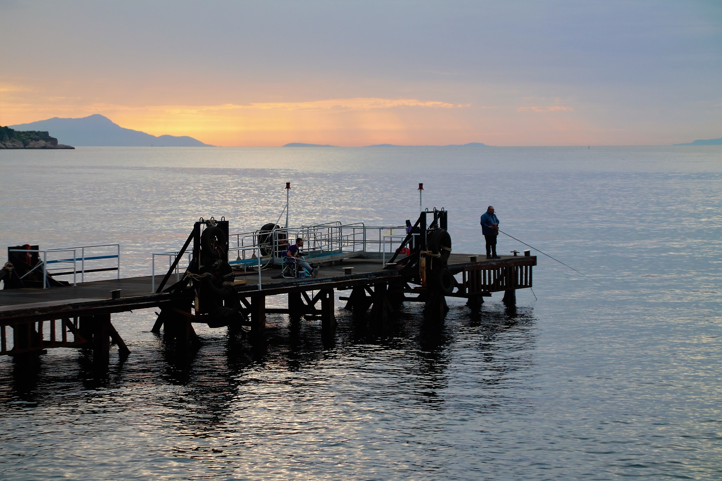 Fishermen at sunset