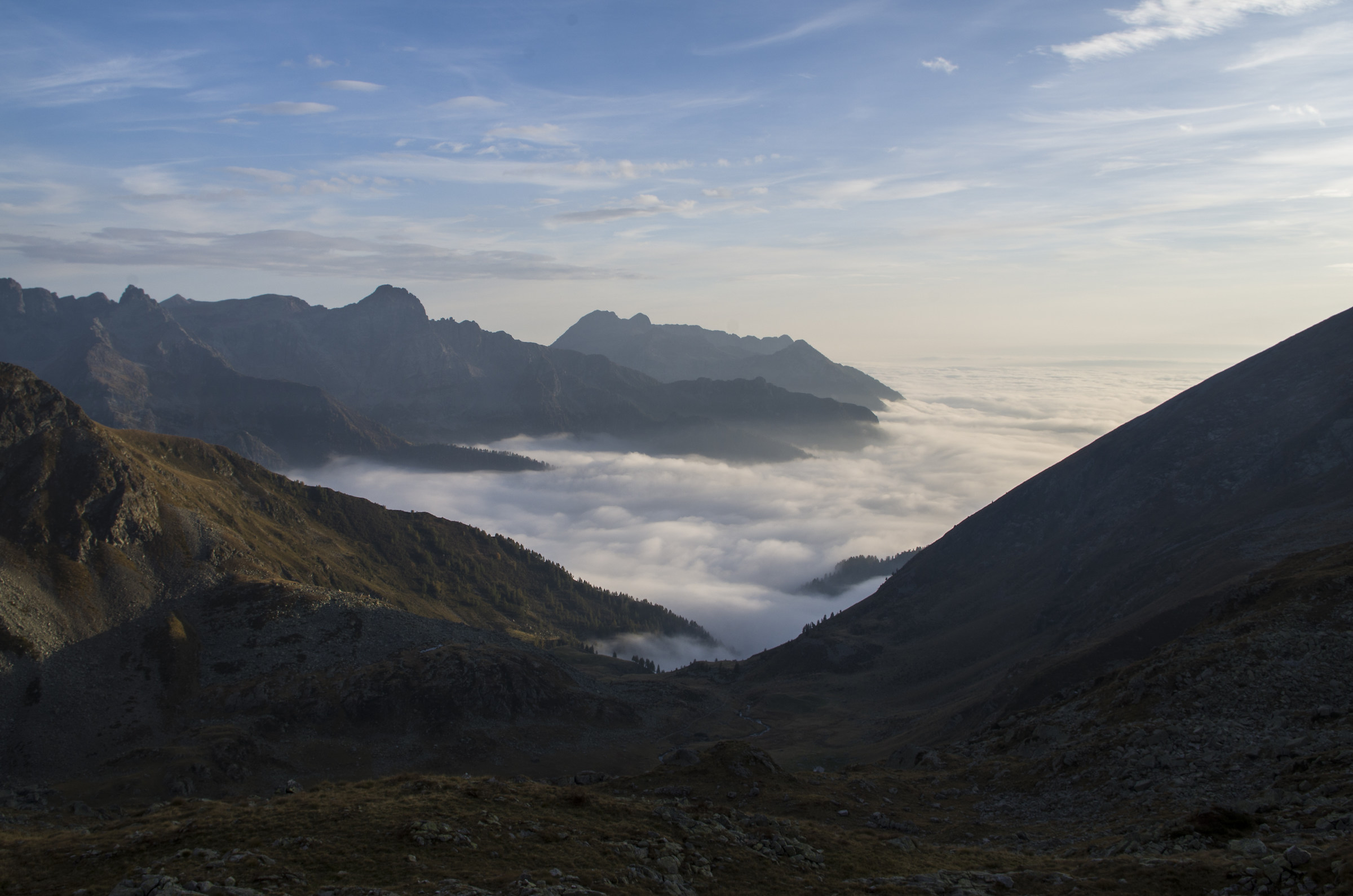 Over the clouds at sunset