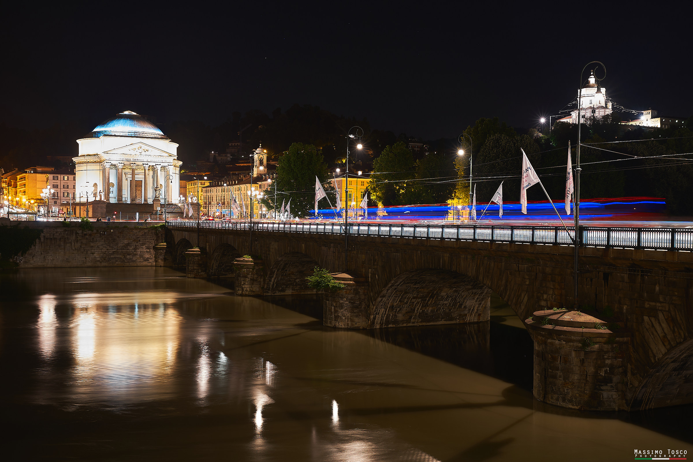 Bus crosses the bridge Vittorio Emanuele I