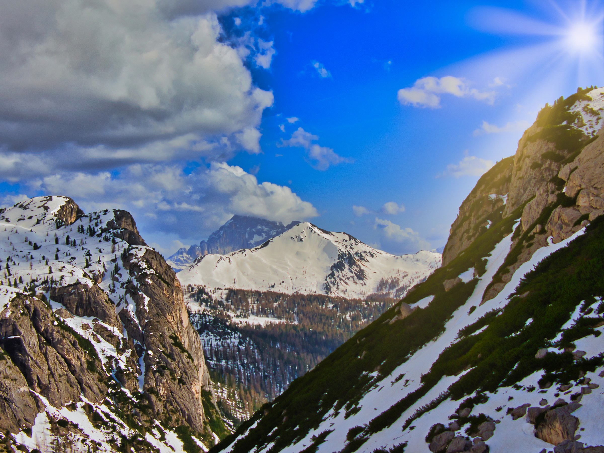 Try Olympus 12-100 F/4