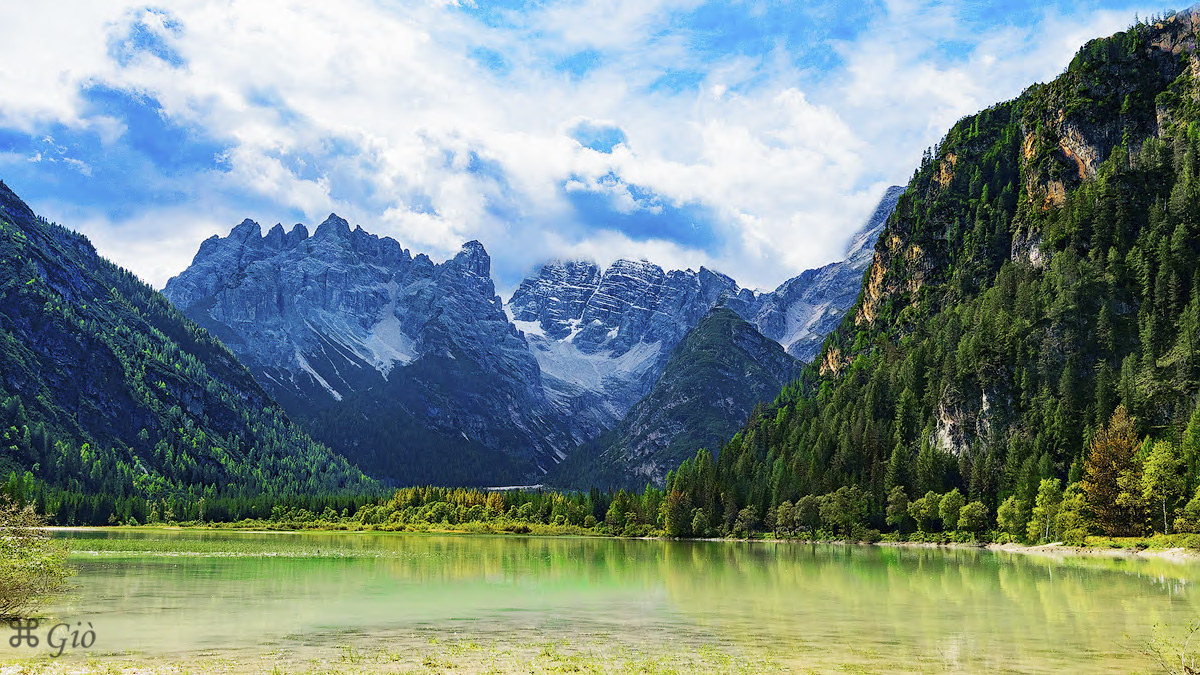 Lake Lando with three peaks Lavaredo and M. Crystal