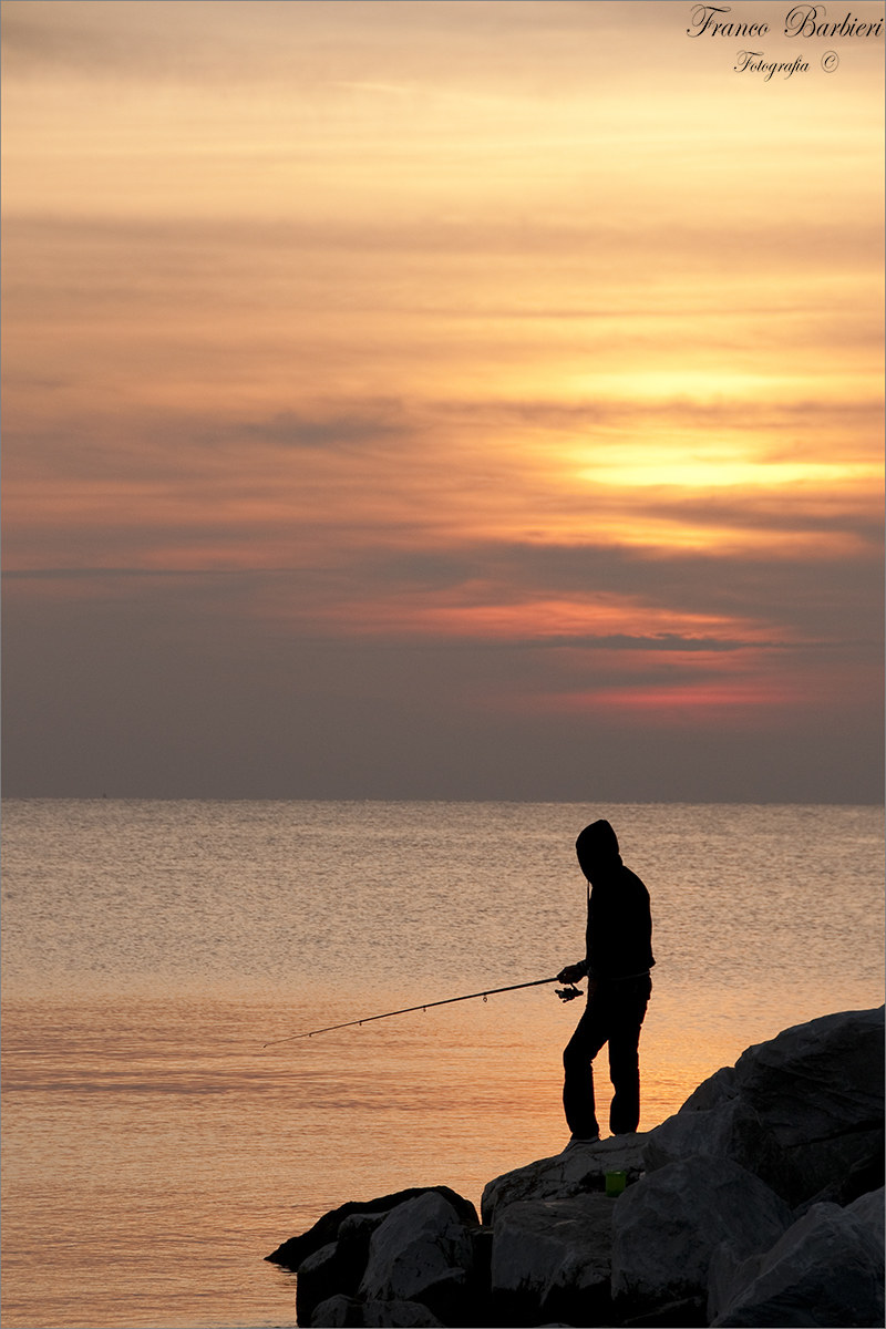 Fisherman at sunset