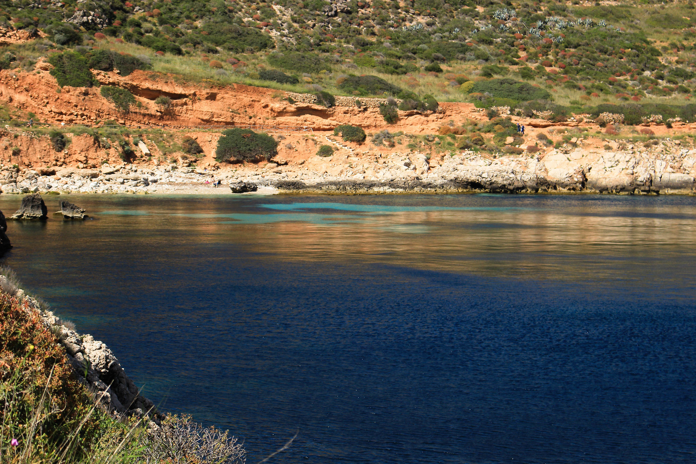 A dip where the water is more blue