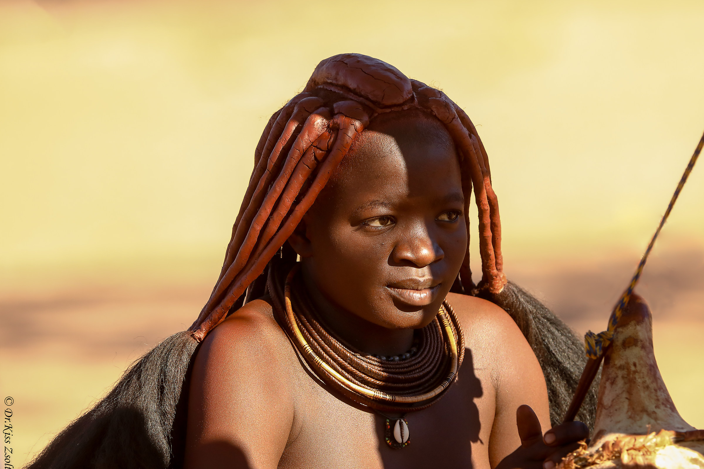 Churning himba woman