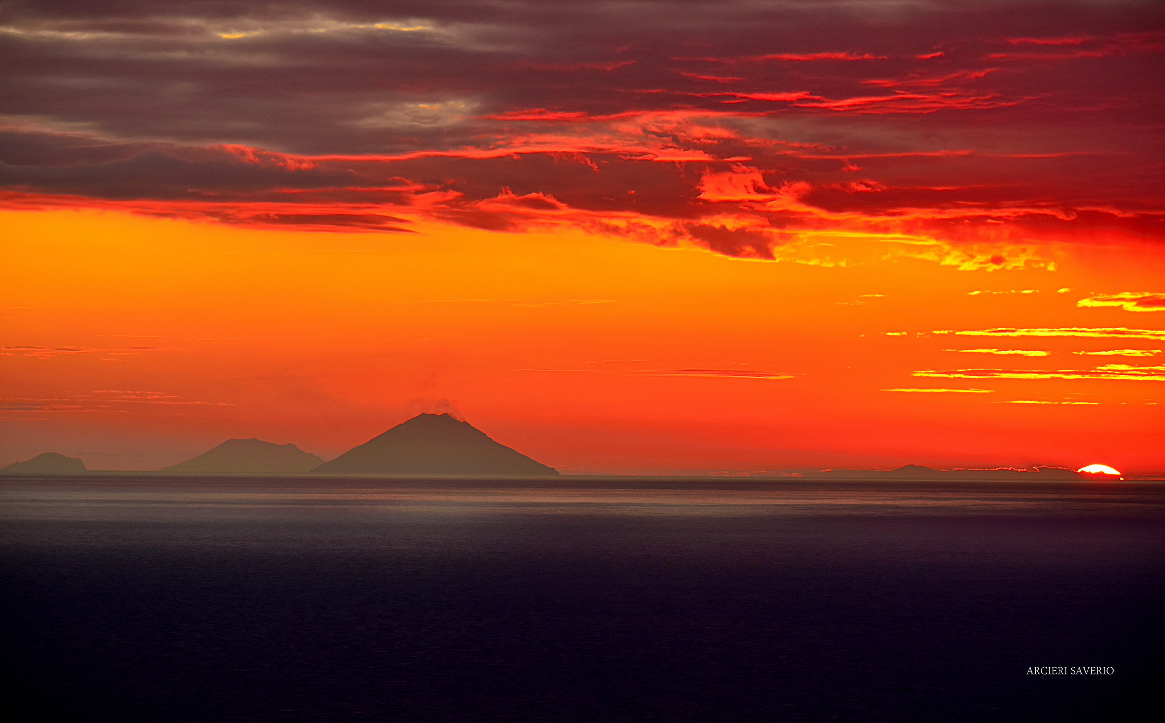 The sun paints the clouds