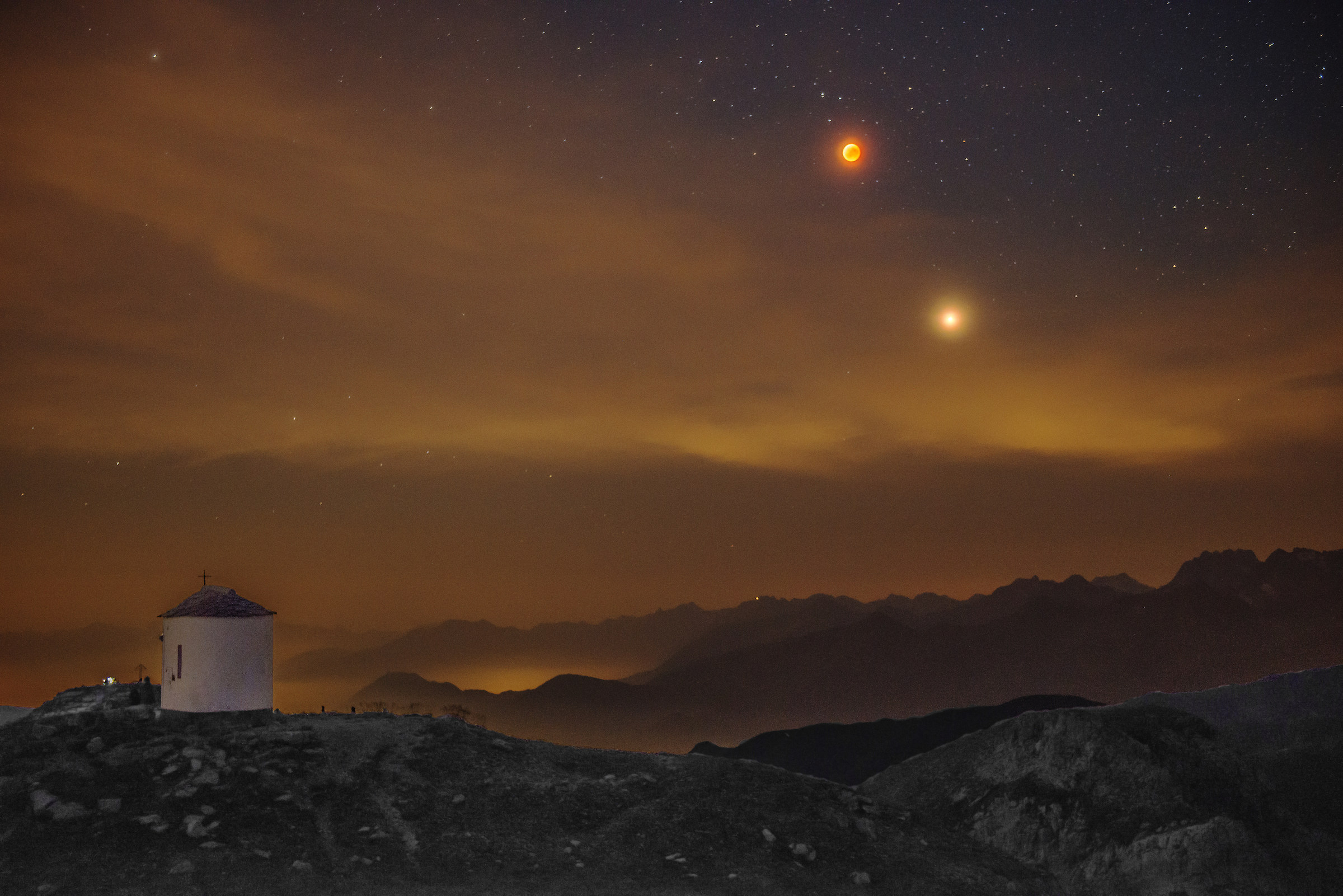Lunar eclipse in the high mountains.