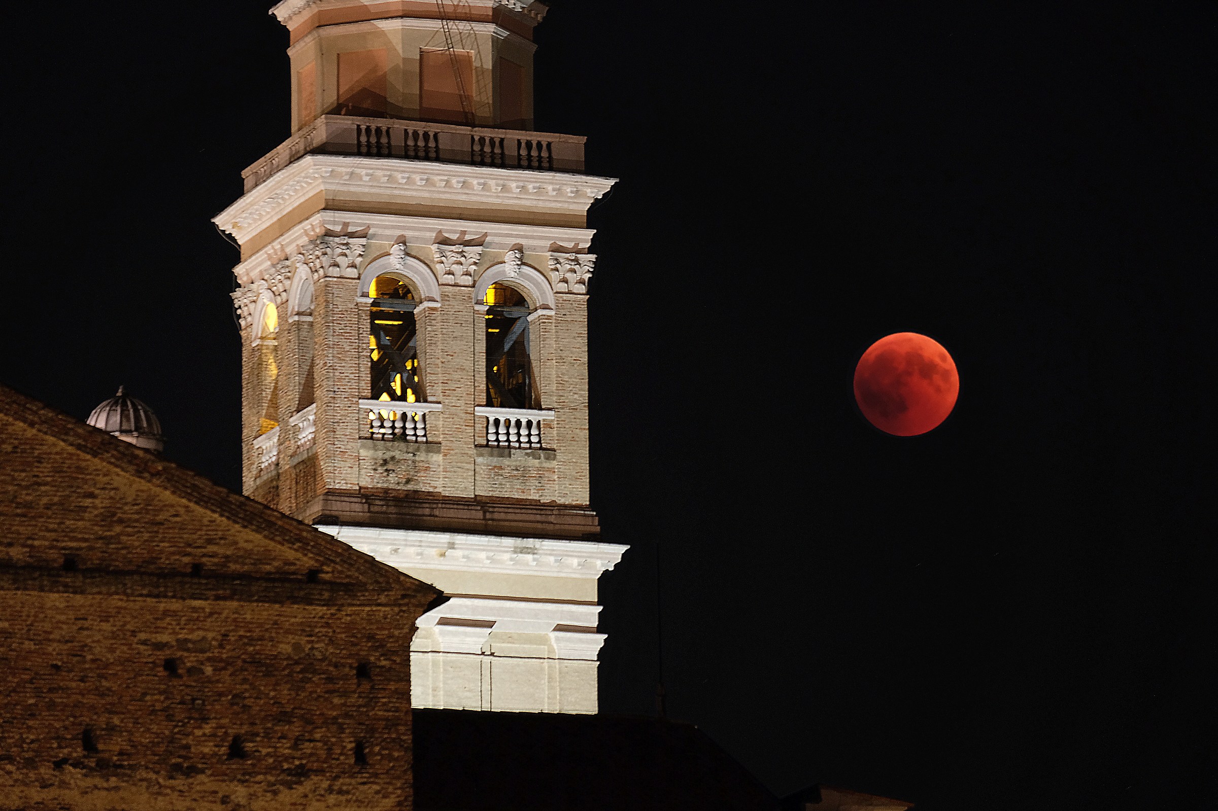 Eclipse of the Moon: The bell tower of S. Giustina