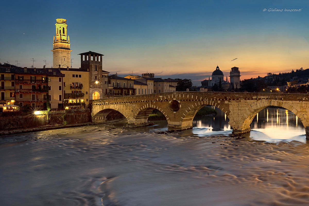 The stone bridge dresses in the evening